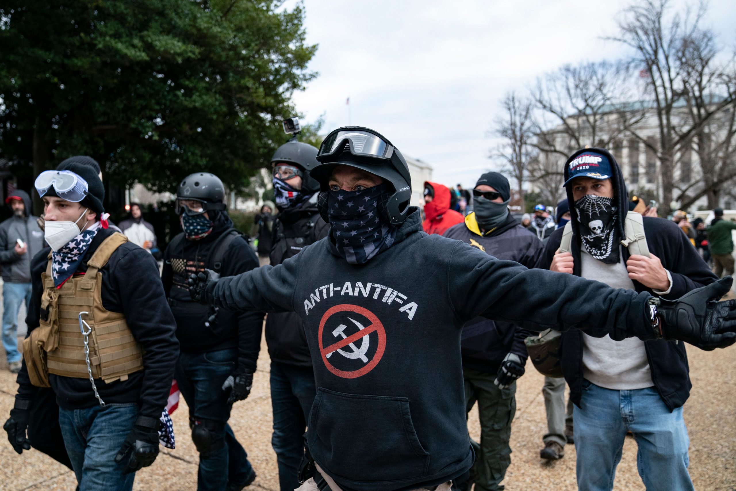 Protester who claim to be a members of the Proud Boys gather with other supporters of US President Donald Trump protest outside the US Capitol on January 6, 2021, in Washington, DC. - Demonstrators breeched security and entered the Capitol as Congress debated the a 2020 presidential election Electoral Vote Certification. (Photo by ALEX EDELMAN / AFP) (Photo by ALEX EDELMAN/AFP via Getty Images)