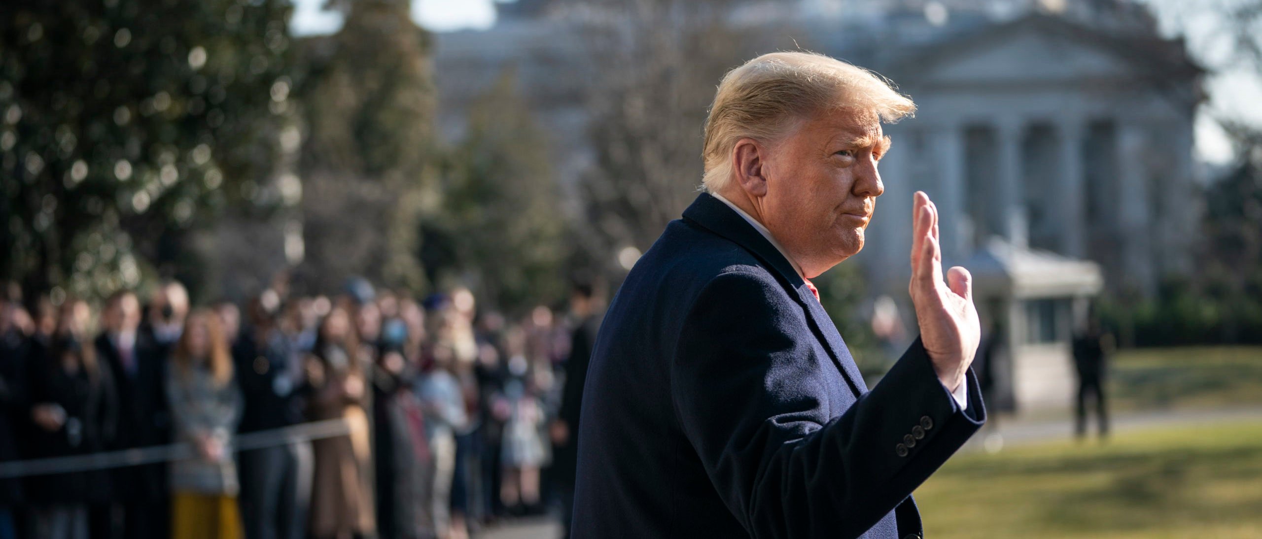 WASHINGTON, DC - JANUARY 12: U.S. President Donald Trump waves as he walks to Marine One on the South Lawn of the White House on January 12, 2021 in Washington, DC. Following last week's deadly pro-Trump riot at the U.S. Capitol, President Trump is making his first public appearance with a trip to the town of Alamo, Texas to view the construction of the wall along the U.S.-Mexico border. (Photo by Drew Angerer/Getty Images)