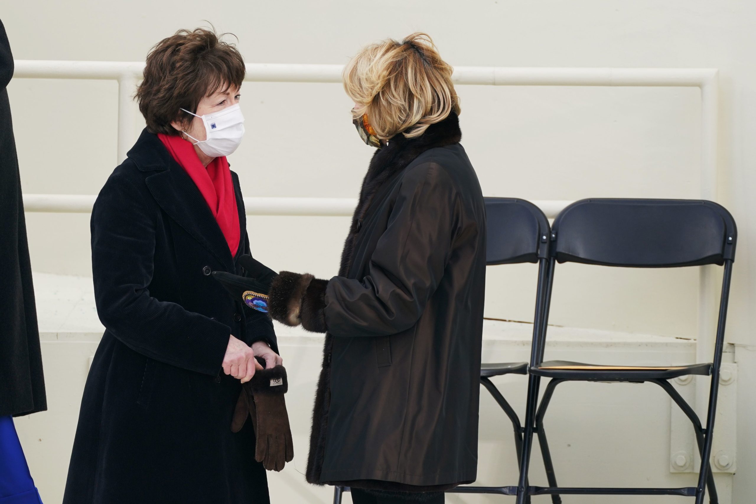 Sens. Susan Collins and Lisa Murkowski speak before President Joe Biden's inauguration ceremony at the Capitol on Jan. 20. (Patrick Semansky/Pool/AFP via Getty Images)