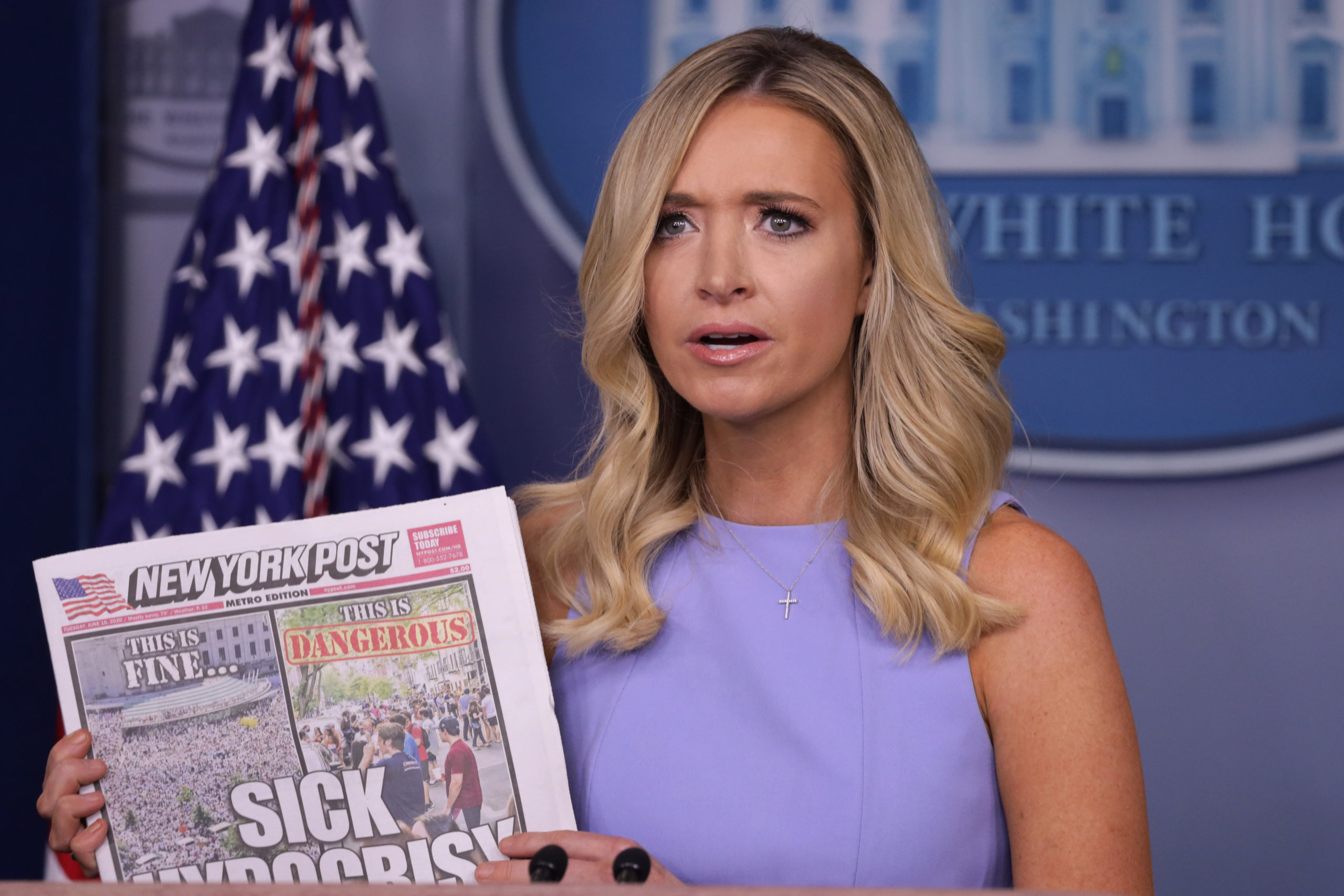 White House Press Secretary Kayleigh McEnany holds up a copy of the New York Post during a news briefing at the James Brady Press Briefing Room of the White House June 17, 2020 in Washington, DC. (Alex Wong/Getty Images)