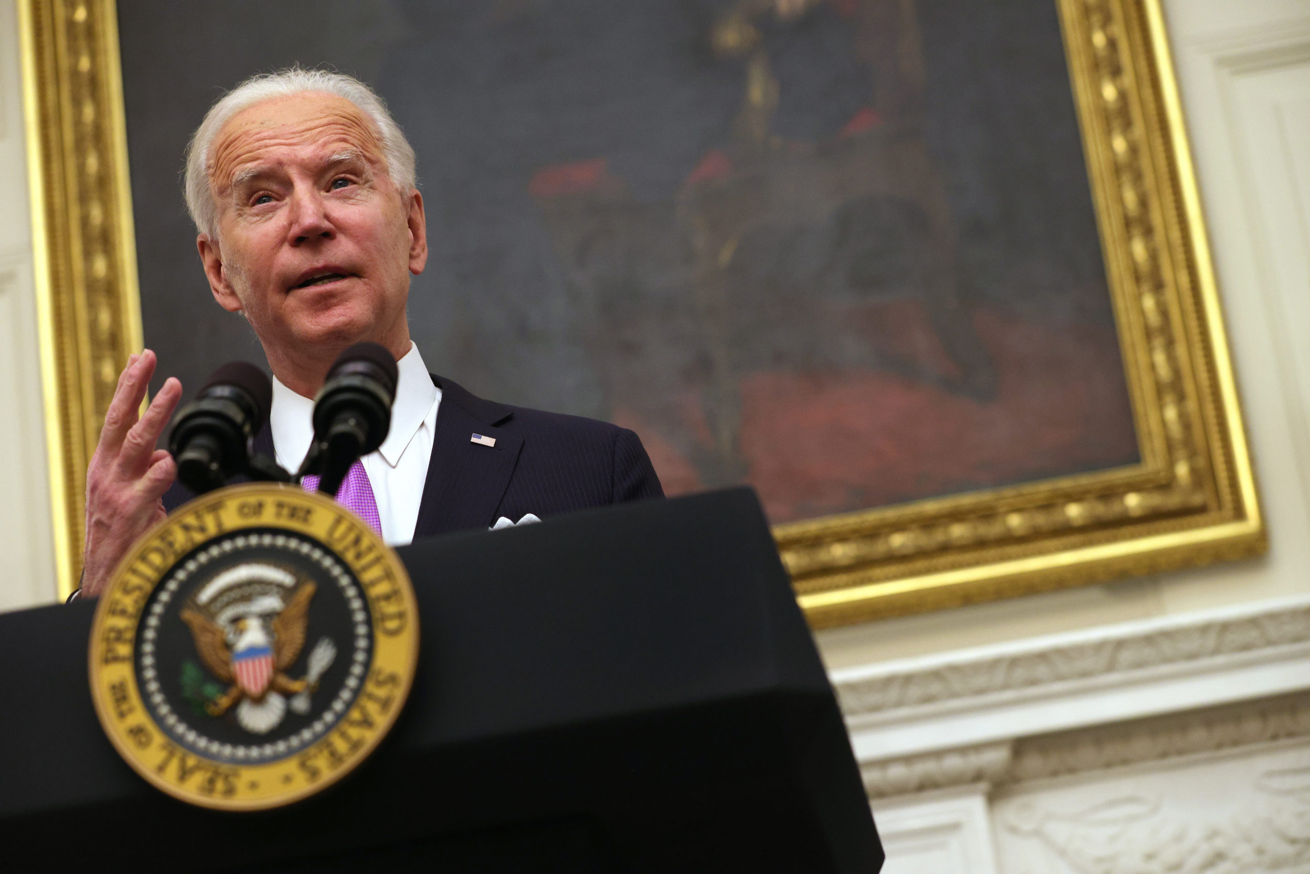 WASHINGTON, DC - JANUARY 21: U.S. President Joe Biden speaks during an event in the State Dining Room of the White House January 21, 2021 in Washington, DC. President Biden delivered remarks on his administration’s COVID-19 response, and signed executive orders and other presidential actions. (Photo by Alex Wong/Getty Images)