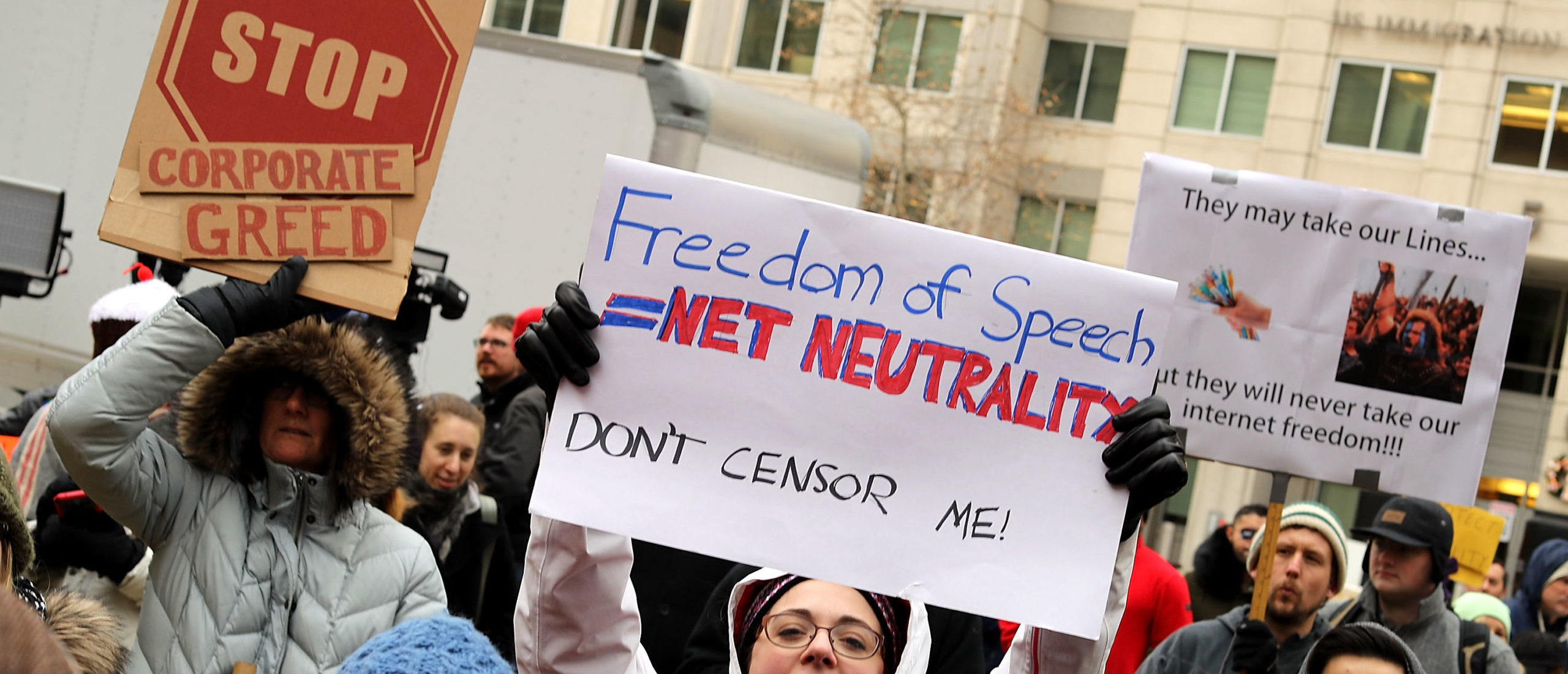WASHINGTON, DC - DECEMBER 14: Demonstrators rally outside the Federal Communication Commission building to protest against the end of net neutralityrules December 14, 2017 in Washington, DC. Lead by FCC Chairman Ajit Pai, the commission is expected to do away with Obama Administration rules that prevented internet service providers from creating different levels of service and blocking or promoting individual companies and organizations on their systems. (Photo by Chip Somodevilla/Getty Images)