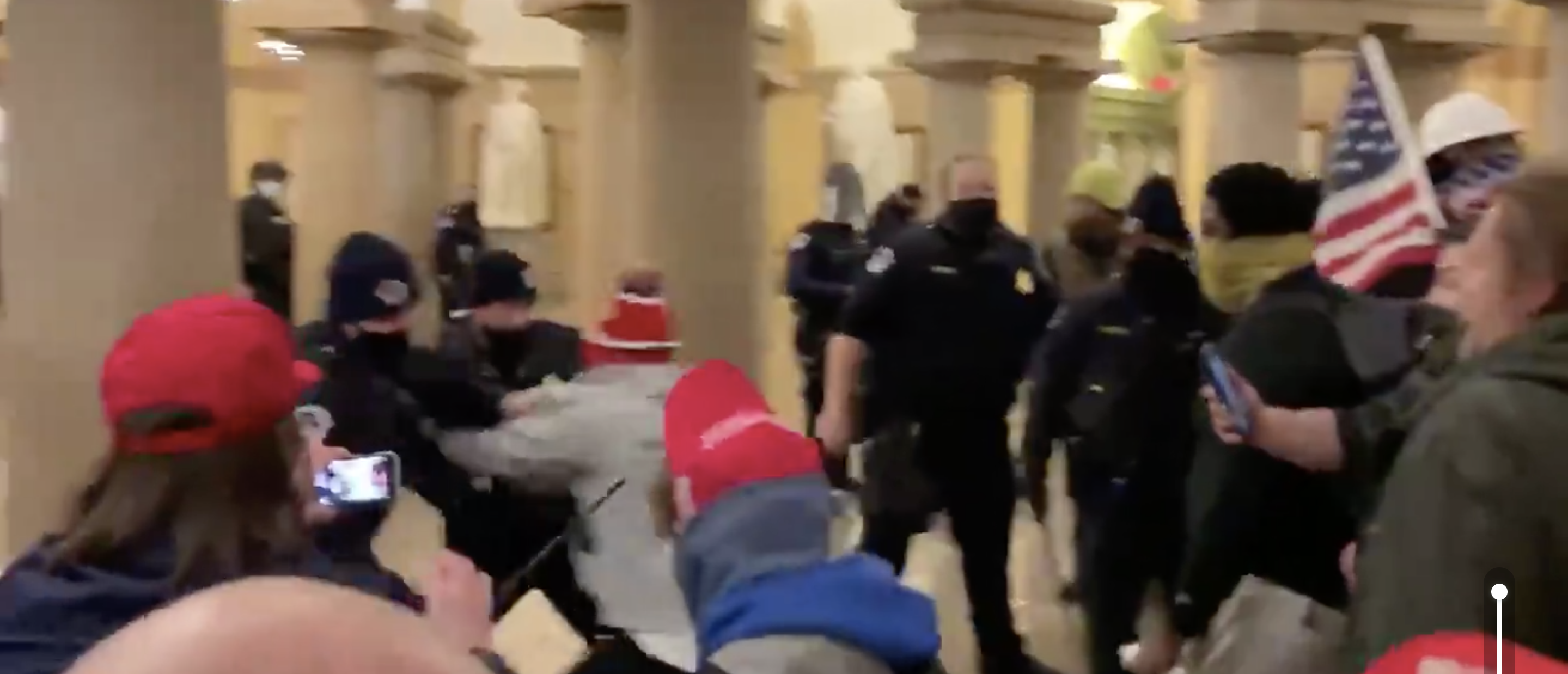 Rioters brawl with police officers after storming the Capitol Building (Screenshot/Twitter Elijah Schaffer)