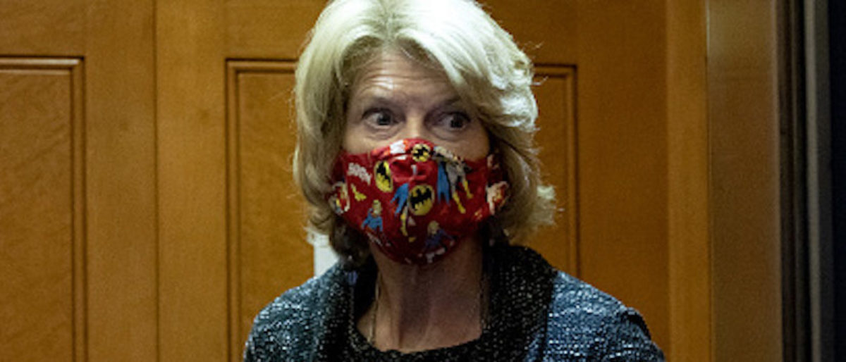 Senator Lisa Murkowski, a Republican from Alaska, wears a protective mask in an elevator at the U.S. Capitol in Washington, D.C., U.S., on Thursday, Dec. 3, 2020. House Speaker Pelosi and Senate Democratic leader Schumer yesterday threw their support behind using a $908 billion bipartisan stimulus proposal as the foundation for a new round of negotiations with congressional Republicans and the White House. Photographer: Stefani Reynolds/Bloomberg via Getty Images