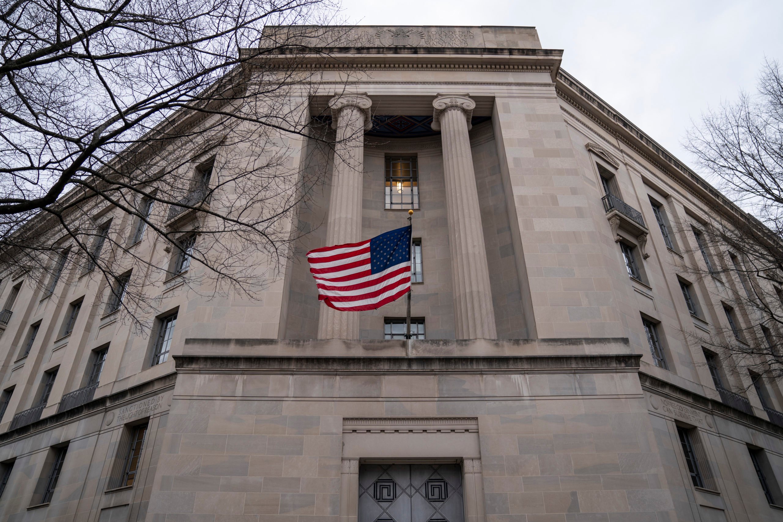 WASHINGTON, DC - FEBRUARY 19: The Department of Justice headquarters stands on February 19, 2020 in Washington, DC. A Department of Justice spokesperson is denying that Attorney General William Barr is considering resigning after his critical comments about President Trump Trump tweeting about ongoing Department of Justice cases. (Photo by Drew Angerer/Getty Images)