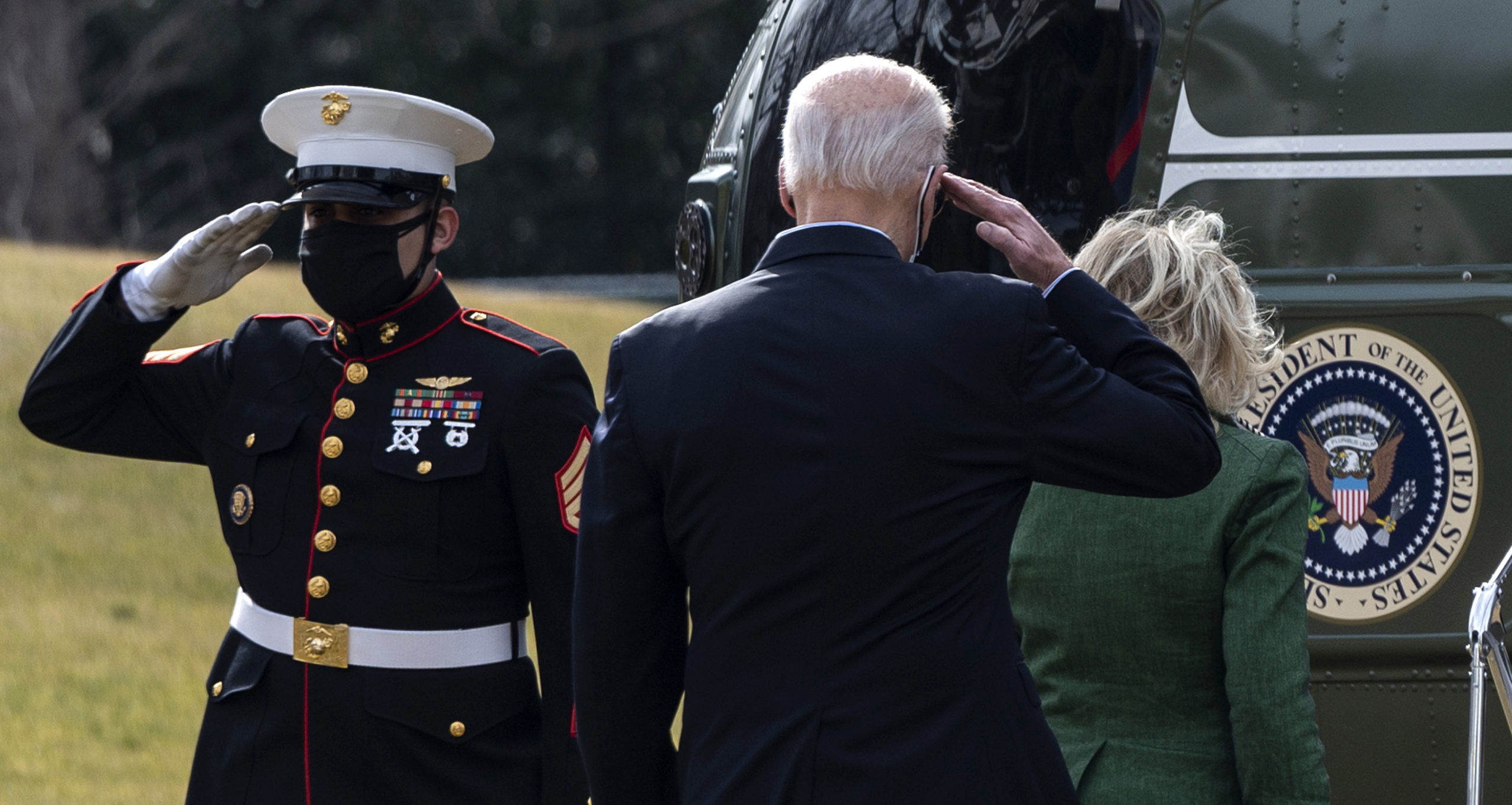 US President Joe Biden and First Lady Jill Biden walk to Marine One as they depart from the South Lawn of the White House in Washington, DC on February 26, 2021. - President Biden and First Lady travel to Texas to visit a food bank and emergency operations center after a winter storm left millions without electricity and clean water for days (Photo by ANDREW CABALLERO-REYNOLDS/AFP via Getty Images)