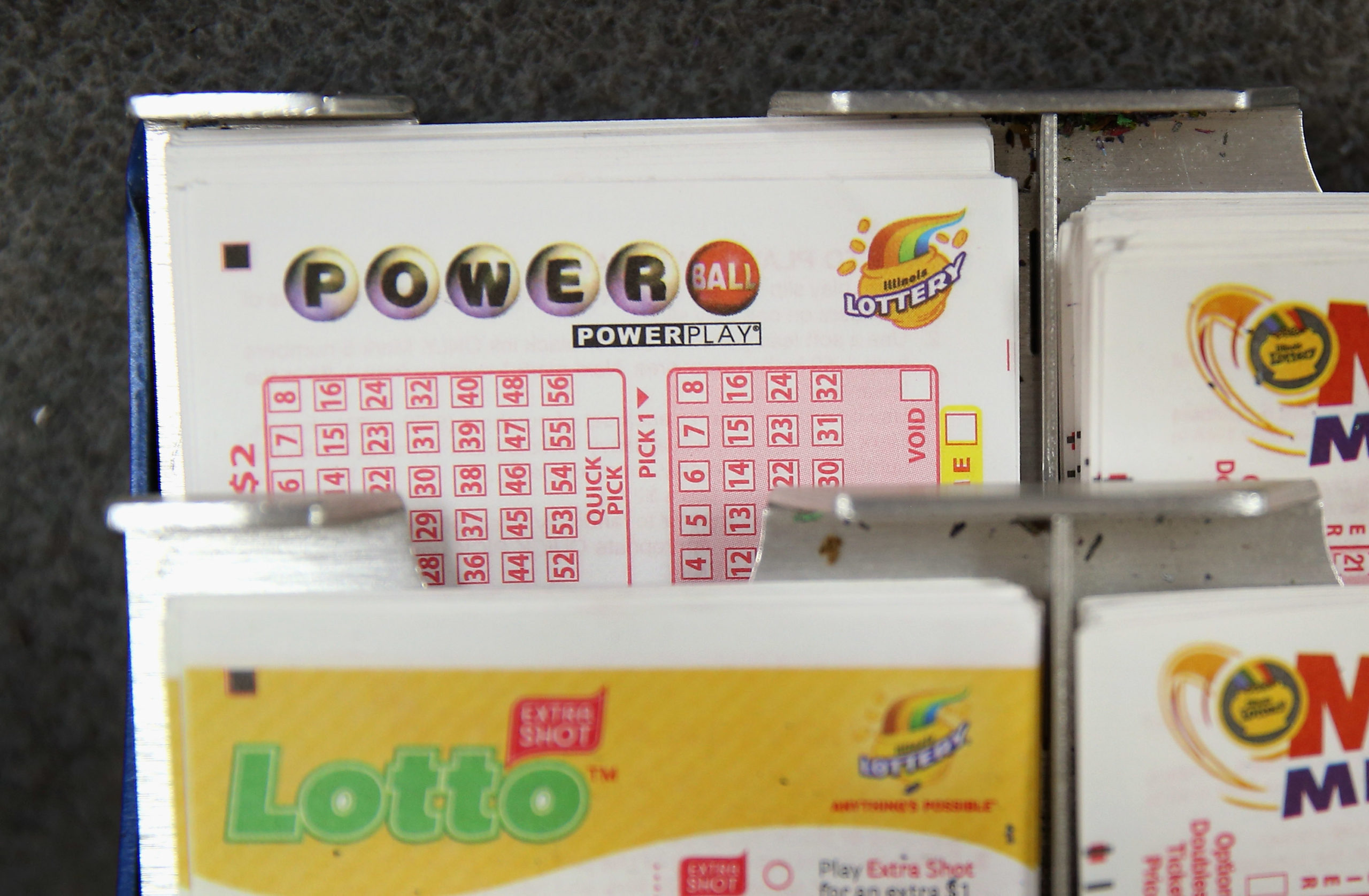 CHICAGO, IL - AUGUST 07: Cards used to select Powerball and other lottery numbers sit on the counter at a 7-Eleven store on August 7, 2013 in Chicago, Illinois. The Powerball jackpot for tonight's drawing is $425 million, the third-highest total ever. (Photo by Scott Olson/Getty Images)