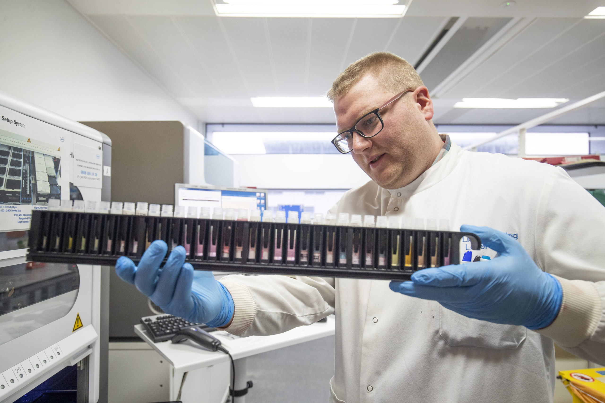 Clinical support technician Douglas Condie extracts viruses from swab samples so that the genetic structure of a virus can be analysed and identified in the coronavirus testing laboratory at Glasgow Royal Infirmary, on February 19, 2020 in Glasgow, Scotland. (Photo by Jane Barlow - WPA Pool/Getty Images)