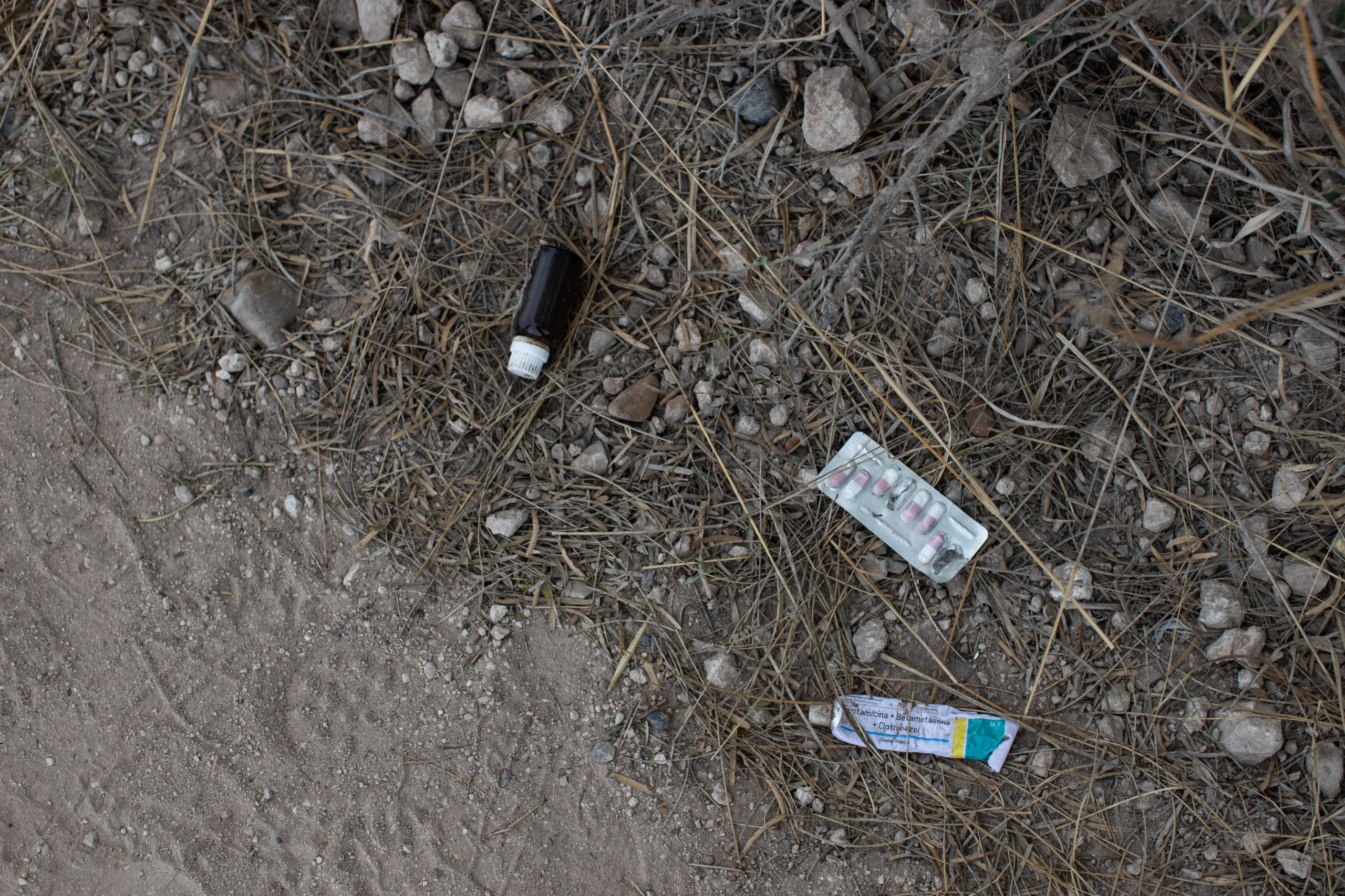 A private landowner has found increasing amounts of trash left behind by illegal migrants including medication, bags, clothing and bottles as they walk to a Customs and Border Protection field processing facility under the Anzalduas International Bridge near Mission, Texas, on March 26, 2021. (Kaylee Greenlee - Daily Caller News Foundation)