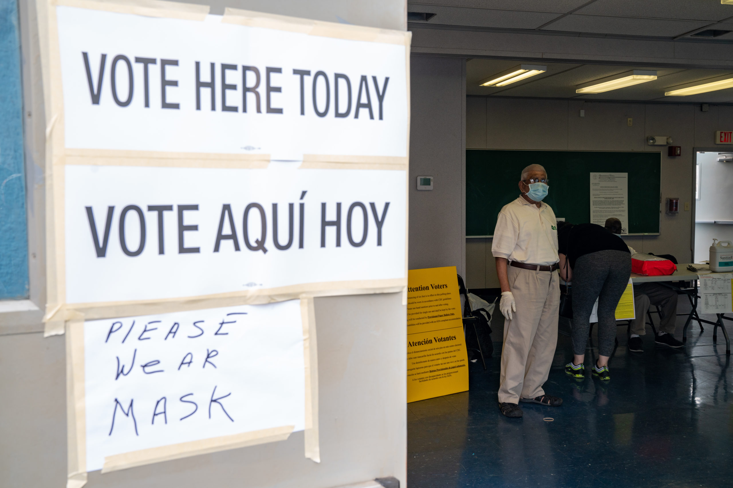 JERSEY CITY, NJ - JULY 07: A poll worker at Liberty High School on July 7, 2020 in Jersey City, New Jersey. New Jersey residents will choose their candidates for president, Senate and House but because of the pandemic most are casting their votes by mail-in ballots. (Photo by David Dee Delgado/Getty Images)