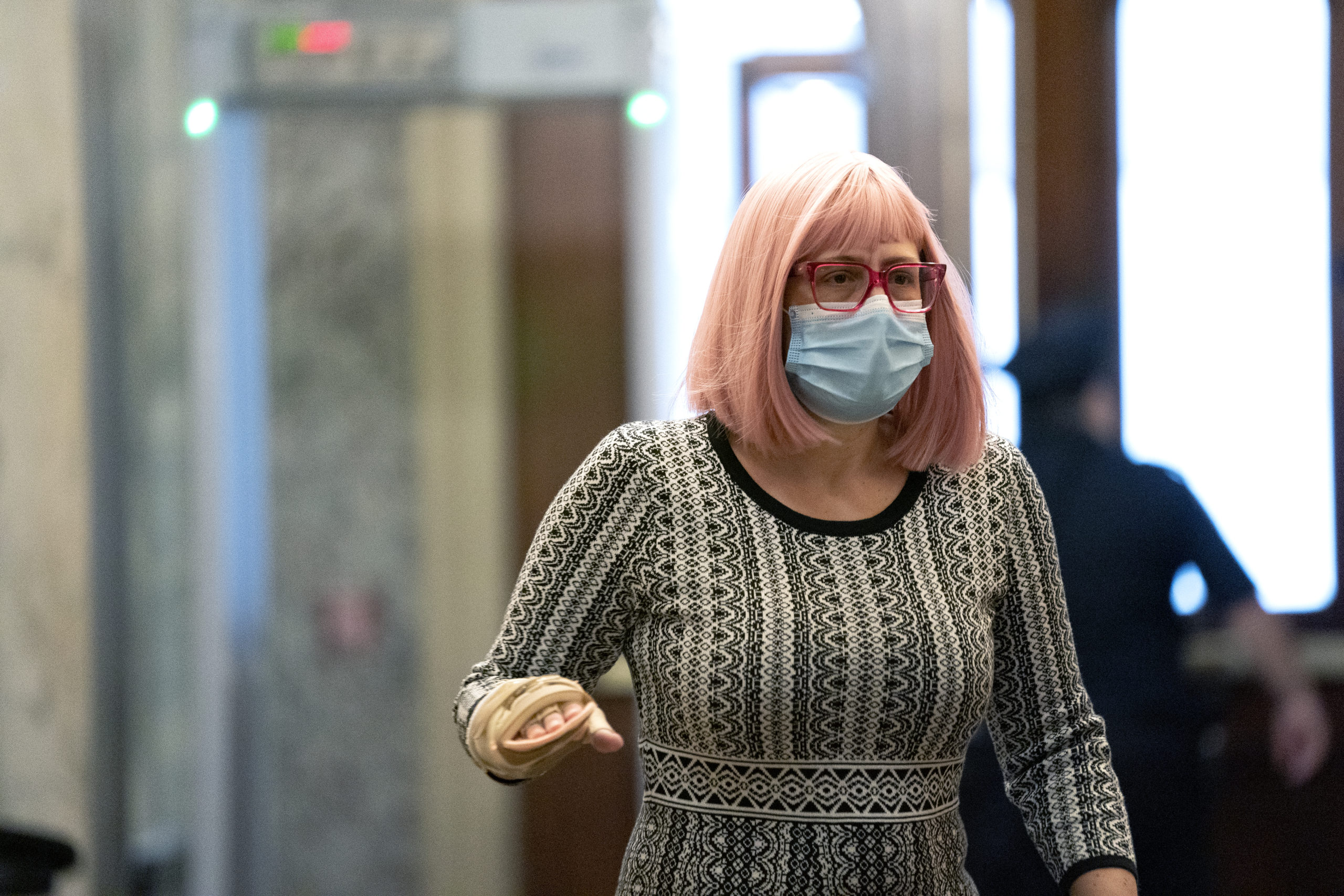 WASHINGTON, DC - DECEMBER 11: U.S. Sen. Kyrsten Sinema (D-AZ) wears a protective mask while arriving to the U.S. Capitol on December 11, 2020 in Washington, DC. Lawmakers are facing a midnight deadline to pass a continuing resolution to avert a partial shutdown and fund the government for another week. (Photo by Stefani Reynolds/Getty Images)