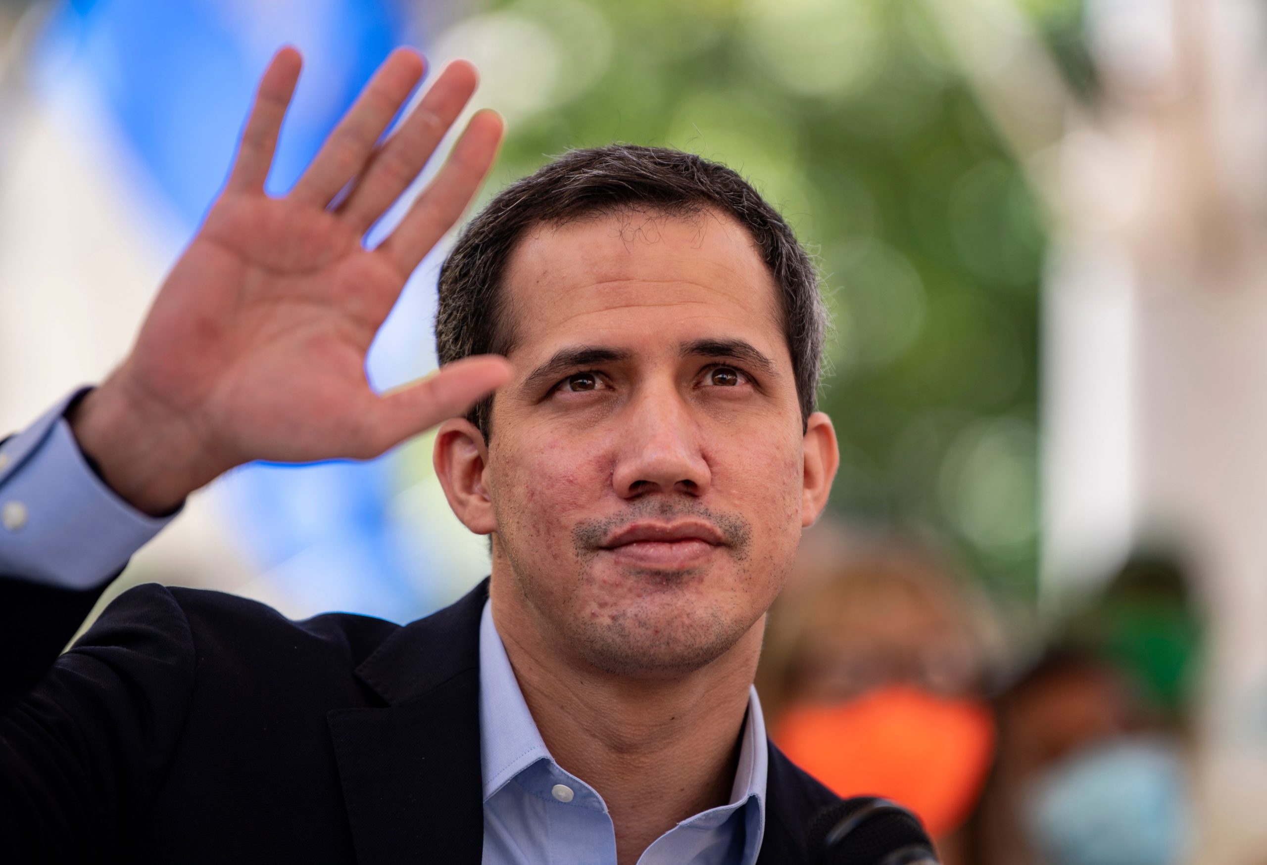 Venezuelan opposition leader Juan Guaido gestures while speaking during a press conference at the Los Palos Grandes square in Caracas on March 3, 2021. - US Secretary of State Antony Blinken spoke Tuesday with Venezuelan opposition leader Juan Guaido, whom Washington recognizes as interim president, and proposed working with allies to increase "multilateral pressure" against Venezuelan president Nicolas Maduro. (Photo by YURI CORTEZ/AFP via Getty Images)
