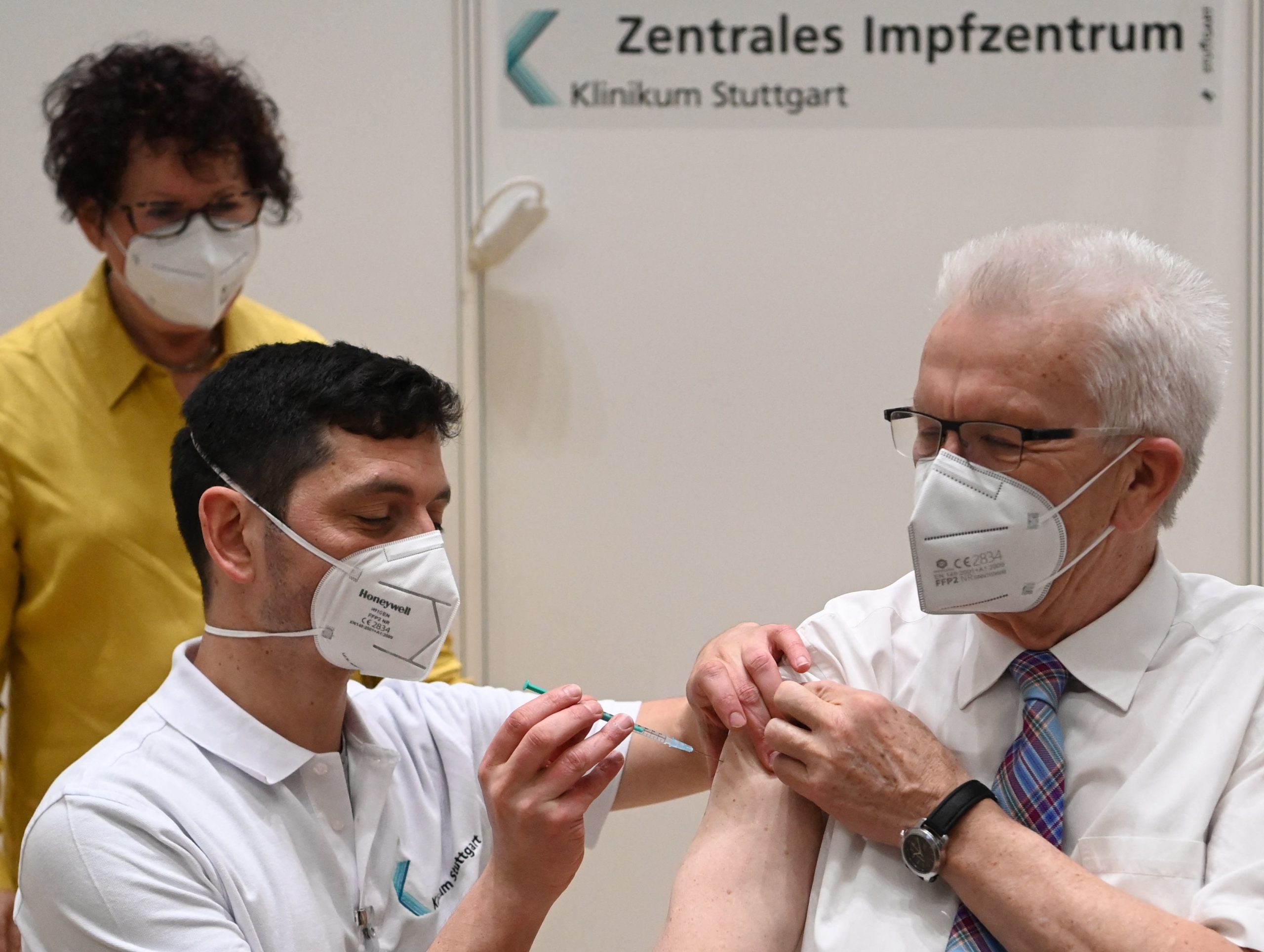 German politician Winfried Kretschmann receives the AstraZeneca vaccine on March 19. (Marijan Murat/Pool/AFP via Getty Images)