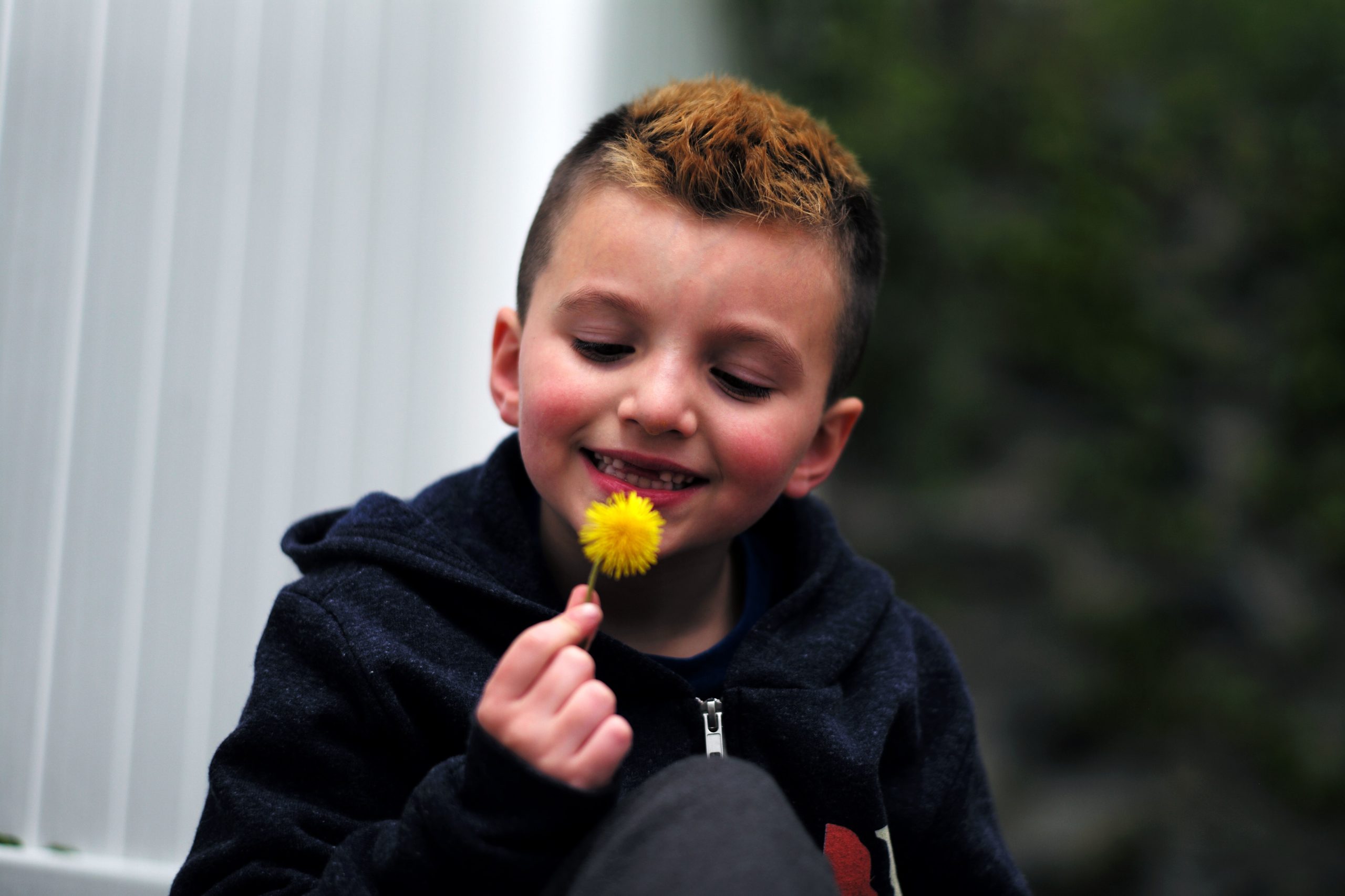 Seven-year-old transgender boy Jacob Lemay poses for photos in the yard of his home in Melrose, Massachusetts, on May 9, 2017. For months in the Lemay home, the same phrase was repeated over and over by their troubled young child, barely more than a toddler, who showed growing signs of depression. "It is a mistake, I am not a girl, I am a boy." That convinced the Lemay family that Mia should become Jacob.  (Photo credit JEWEL SAMAD/AFP via Getty Images)