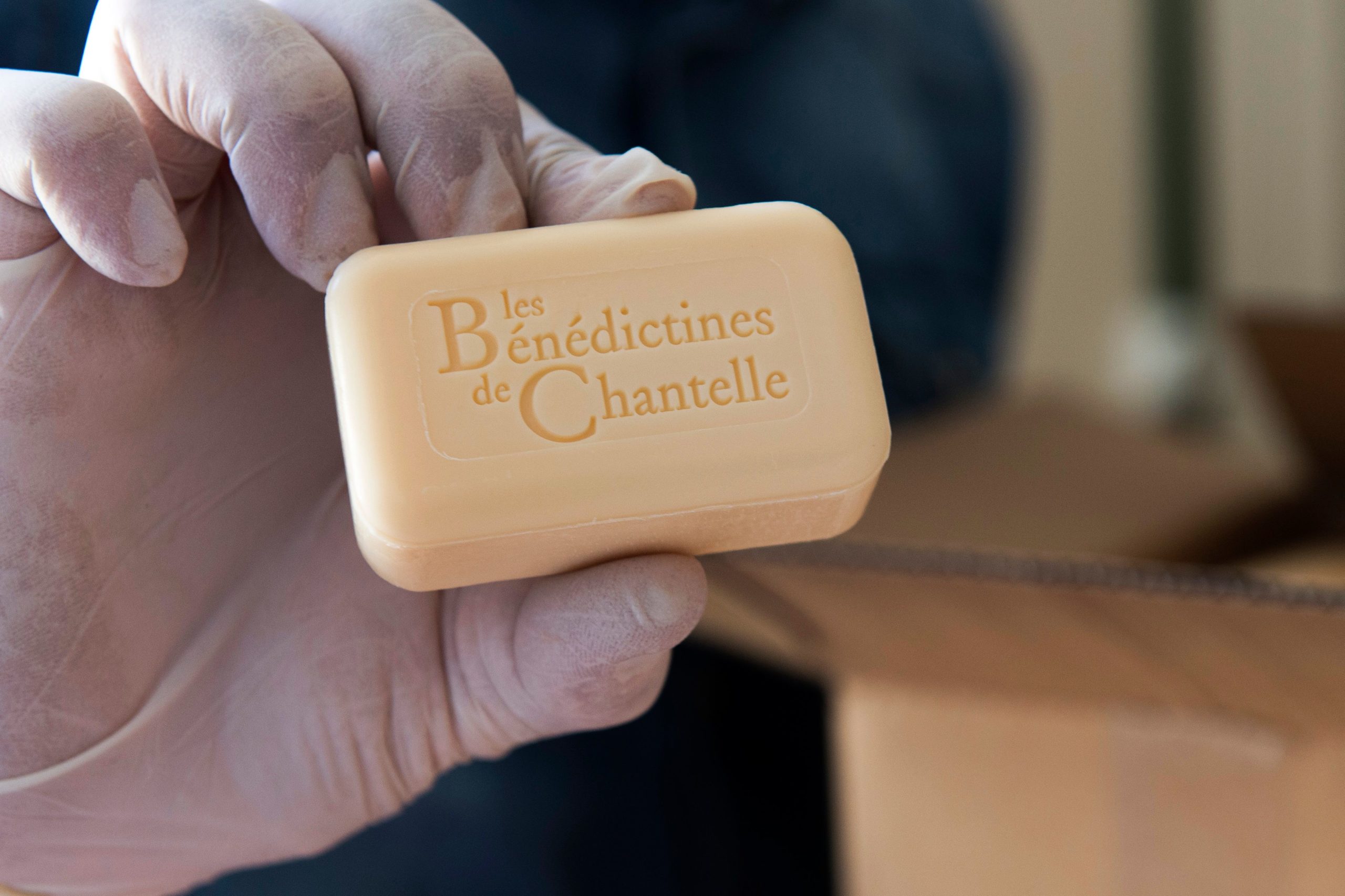 A bar of soap is pictured at the Saint-Vincent abbey in Chantelle on September 30, 2017. - Sisters at the Saint-Vincent abbey in Chantelle, who employ some ten non-religious people, have been manufacturing beauty products since 1954 thanks to two of them, one a chemist and the other a mathematician. Body milk, soaps, shower gels and even moisturizing cream, the abbey's production, with its own laboratory, has continued to diversify by adapting to the current cosmetic standards. (Photo by Thierry Zoccolan / AFP) (Photo by THIERRY ZOCCOLAN/AFP via Getty Images)