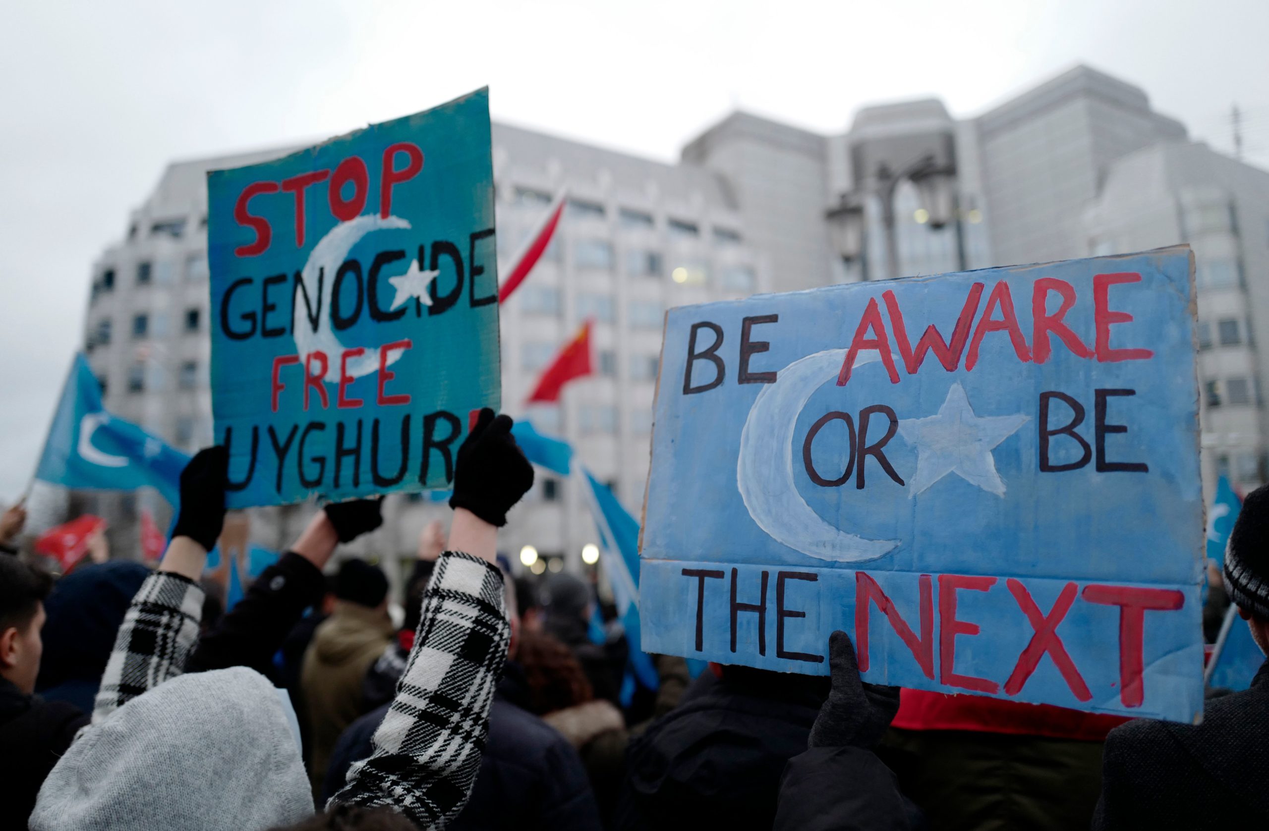 TOPSHOT - Demonstrators take part in a protest outside the Chinese embassy in Berlin on December 27, 2019, to call attention to Chinas mistreatment of members of the Uyghur community in western China. (Photo by John MACDOUGALL / AFP) (Photo by JOHN MACDOUGALL/AFP via Getty Images)