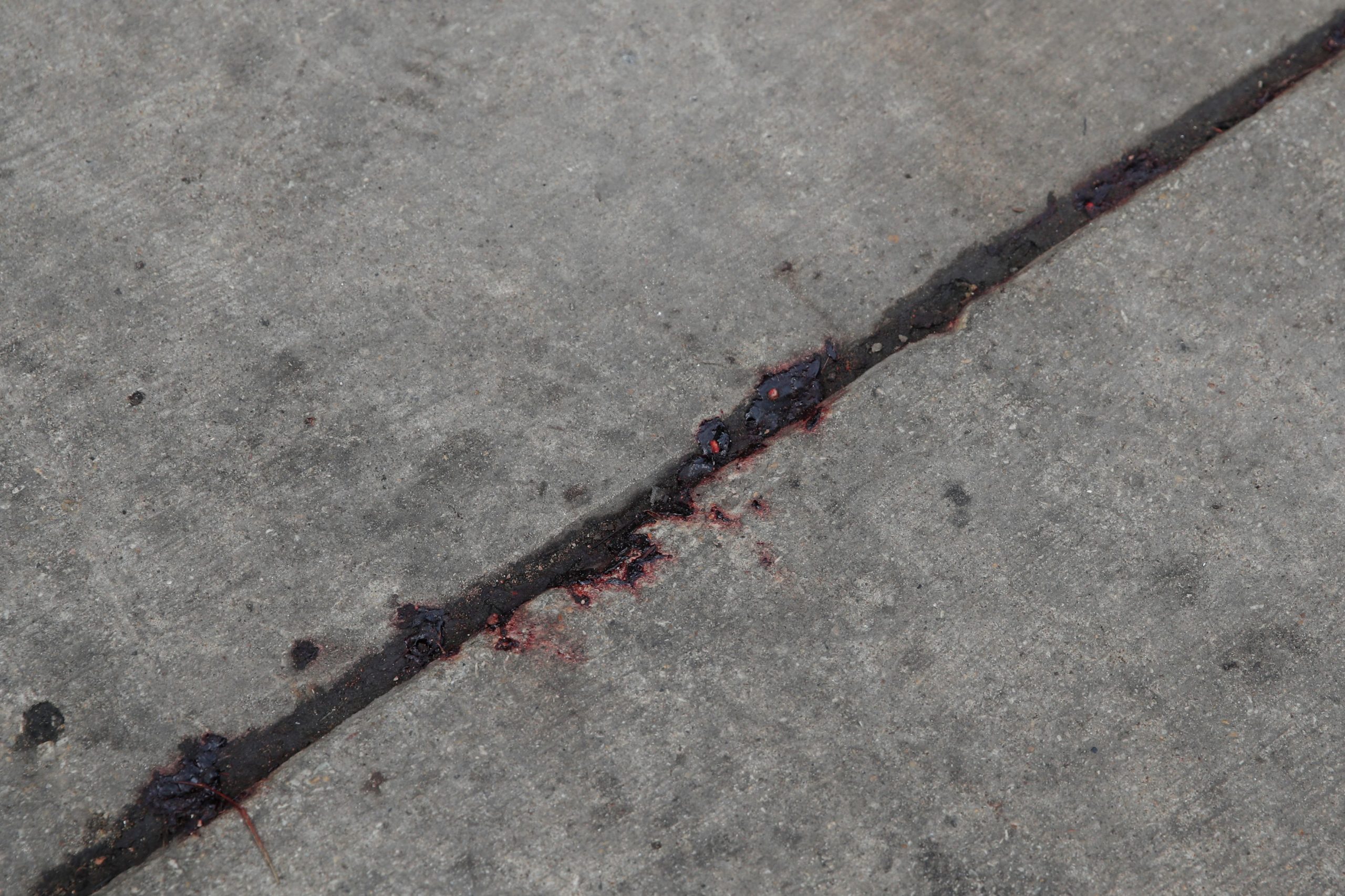 Blood is seen on the ground at the scene of a shooting in Chicago, Illinois, on March 14, 2021. - At least 15 people were shot, two of them fatally, after gunfire broke out at a South Chicago business where a party was being held early on March 14, 2021. (Photo by KAMIL KRZACZYNSKI / AFP) (Photo by KAMIL KRZACZYNSKI/AFP via Getty Images)