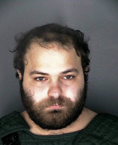 In this handout photo provided by the Boulder, Colorado Police Department, Ahmad Al Aliwi Alissa poses for his booking photo on March 23, 2021 in Boulder, Colorado. (Boulder Police Department via Getty Images)