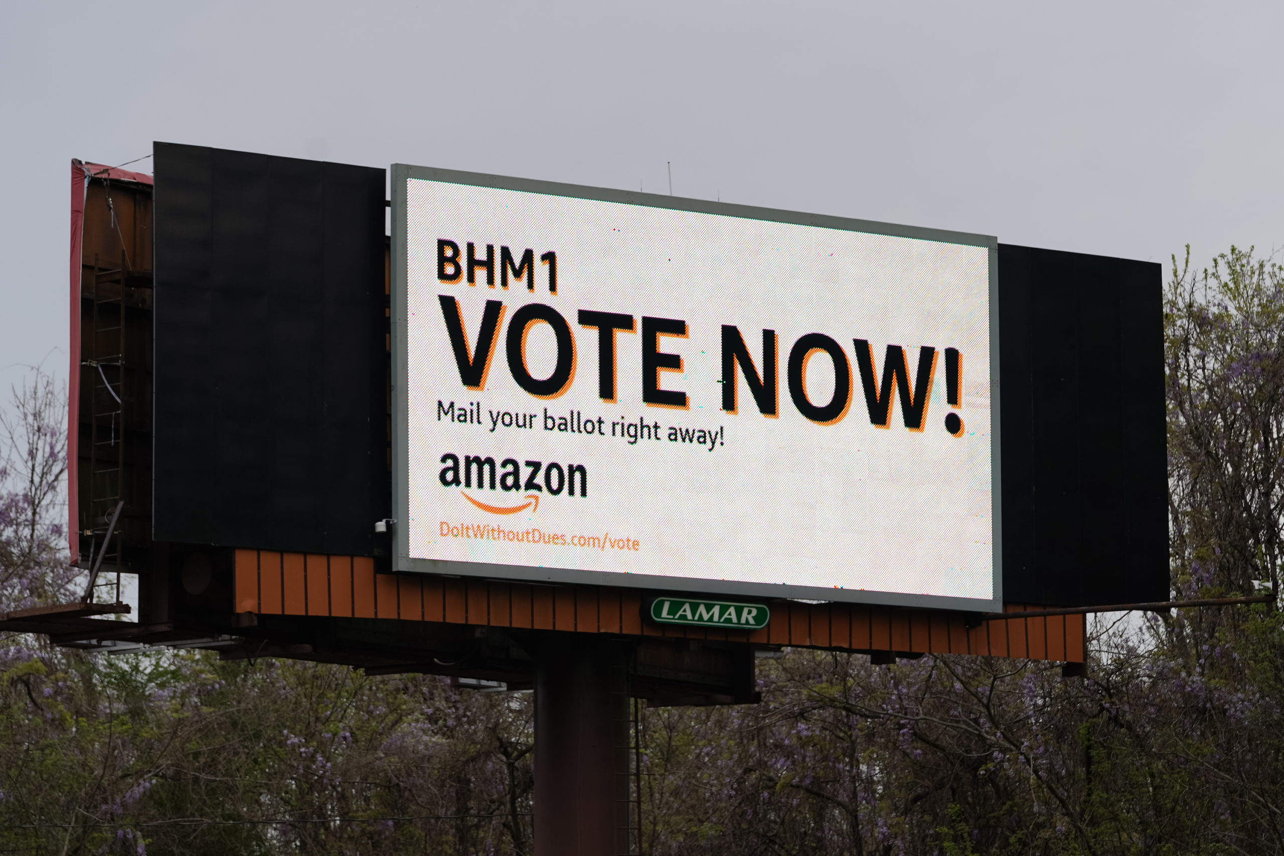 An Amazon-sponsored billboard urging employees to return their unionization ballots is seen on March 28 in Bessemer, Alabama. (Elijah Nouvelage/Getty Images)