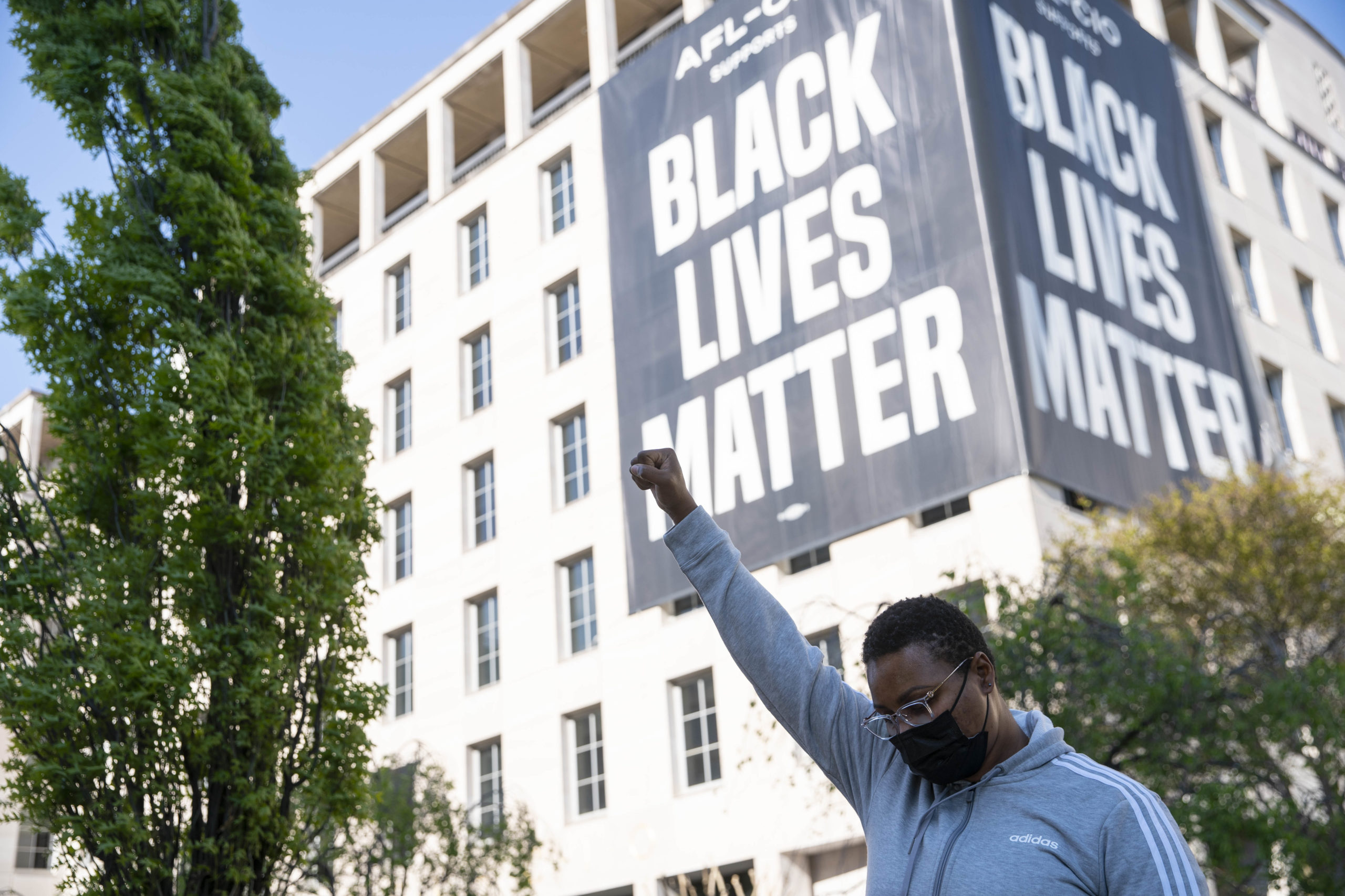 A person celebrates the verdict of the Derek Chauvin trial at Black Lives Matter Plaza near the White House on April 20, 2021. (Photo by Sarah Silbiger/Getty Images)