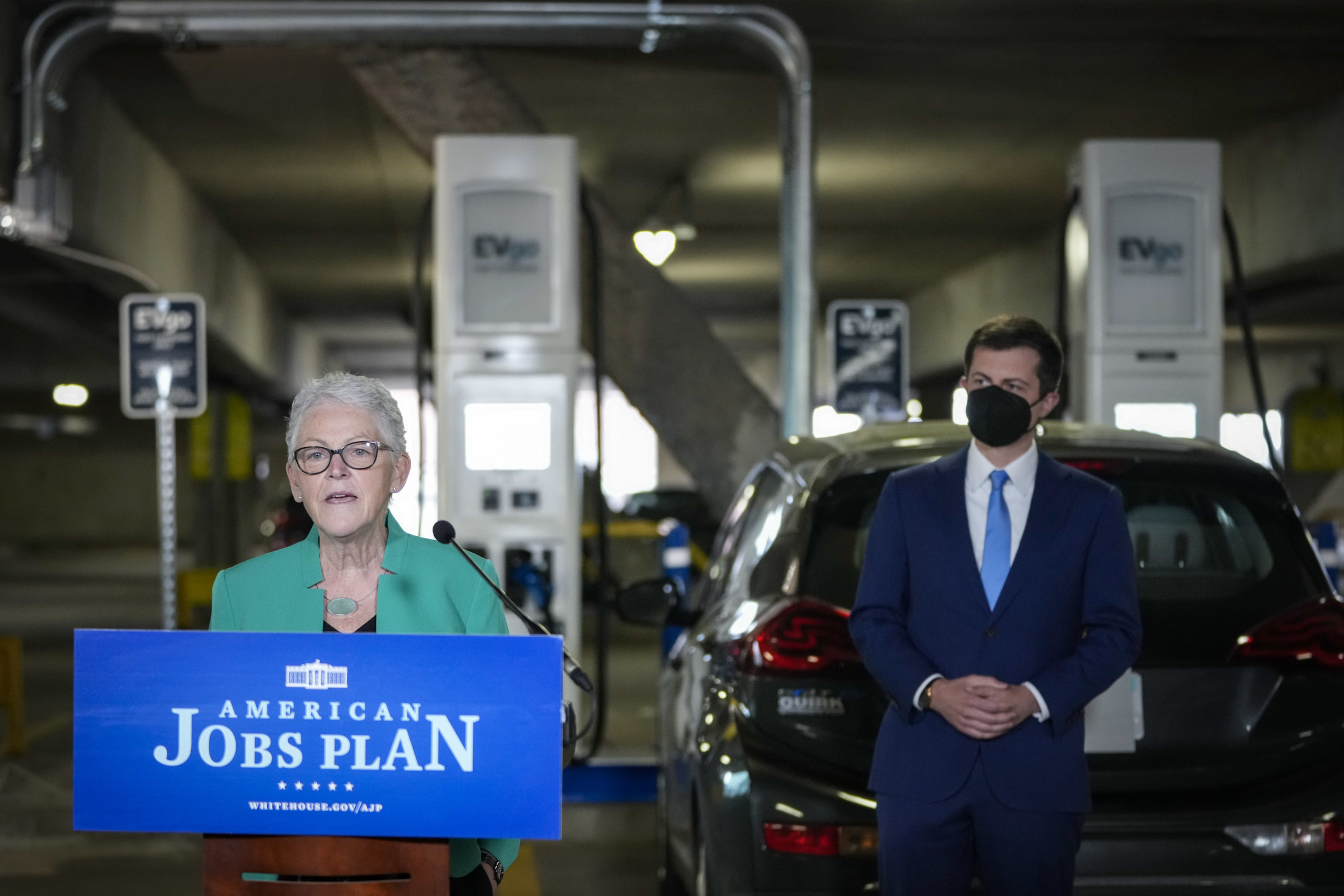 WASHINGTON, DC - APRIL 22: (L-R) White House Climate Adviser Gina McCarthy and U.S. Secretary of Transportation Pete Buttigieg hold a news conference about the American Jobs Plan and to highlight electric vehicles at Union Station near Capitol Hill on April 22, 2021 in Washington, DC. The Biden administration has proposed over $170 billion in spending to boost the production of zero-emission buses and cars and increase the number of EV charging stations. (Photo by Drew Angerer/Getty Images)