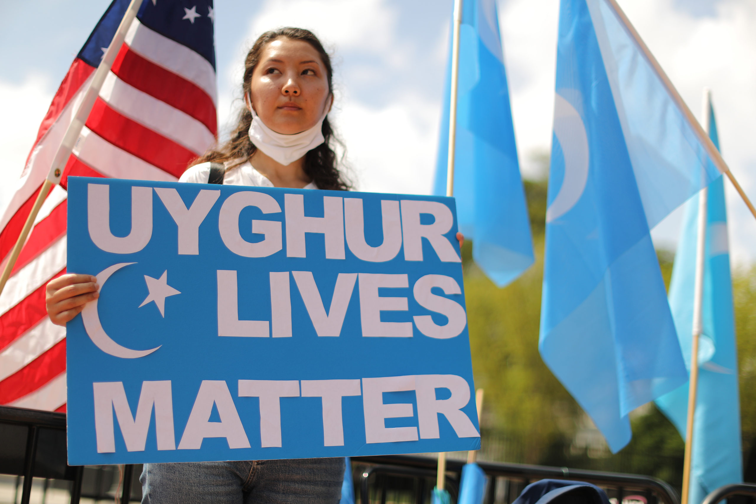 WASHINGTON, DC - AUGUST 14: Supporters and members of the East Turkistan National Awakening Movement rally outside the White House to urge the United States to end trade deals with China and take action to stop the oppression of the Uyghur and other Turkic peoples August 14, 2020 in Washington, DC. The ETNAM and East Turkistan Government in Exile (ETGE) groups submitted evidence to the international criminal court, calling for an investigation into senior Chinese officials, including Xi Jinping, for genocide and crimes against humanity. (Photo by Chip Somodevilla/Getty Images)