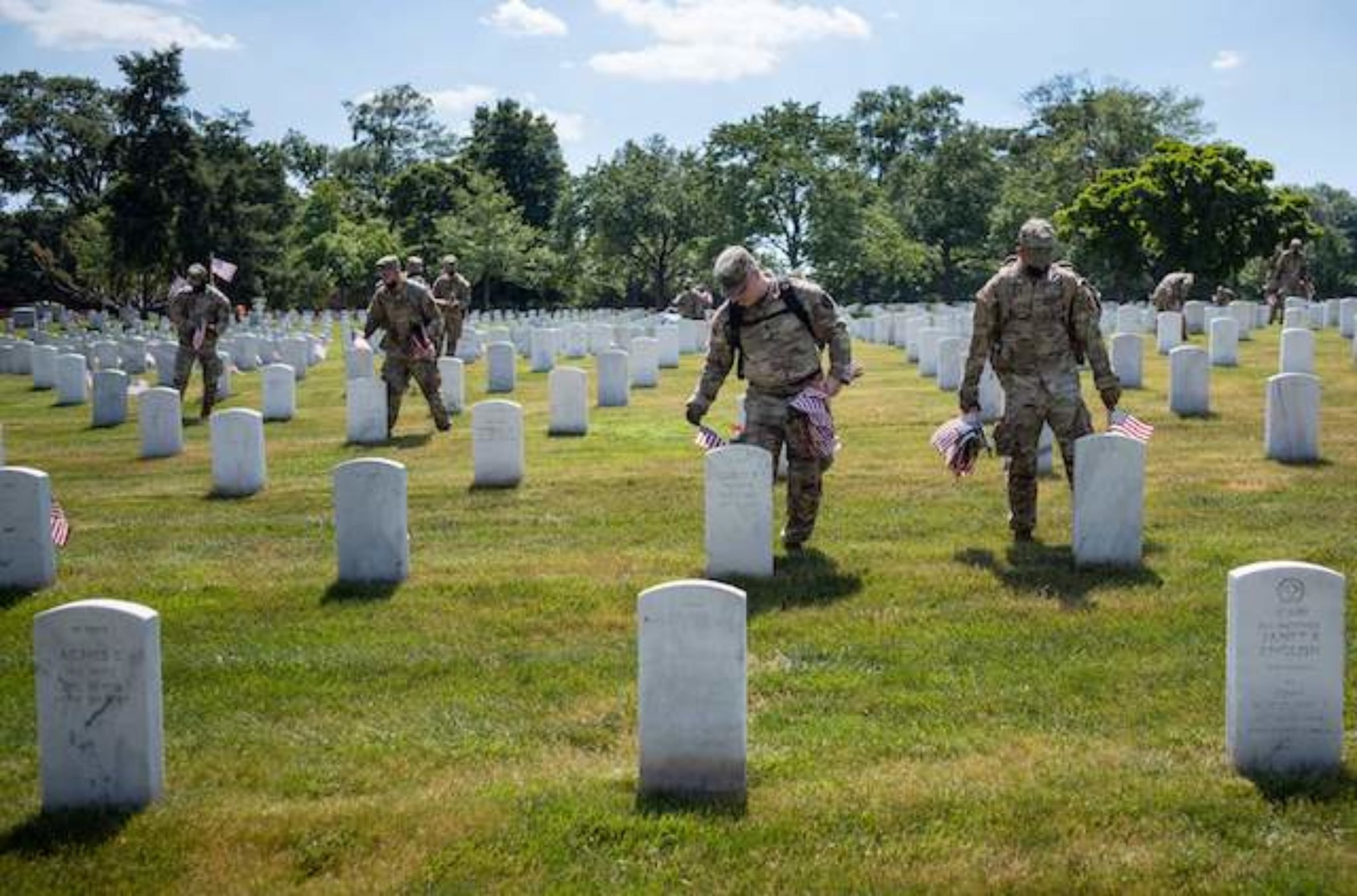 Service Members Place Flags Throughout Arlington National Cemetery