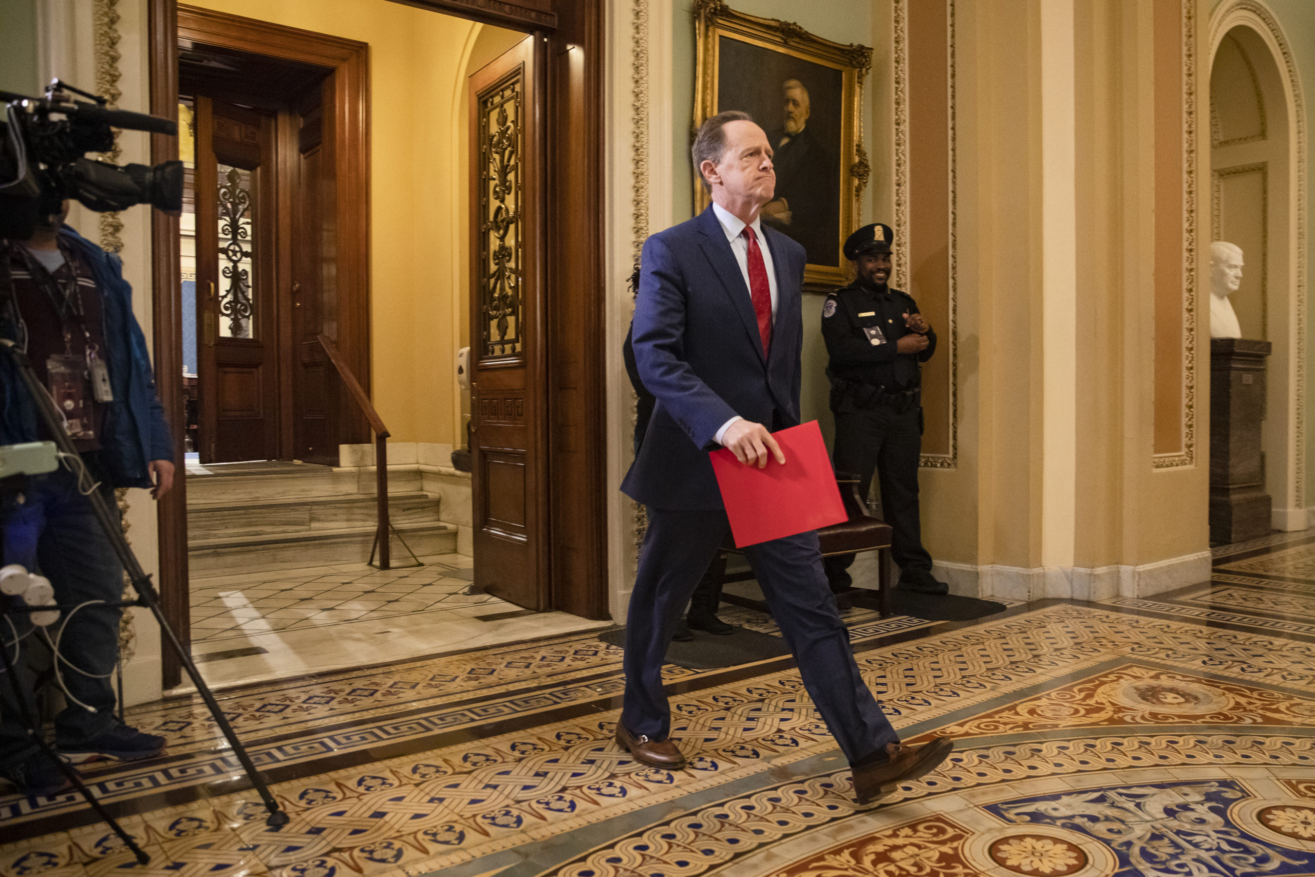 Banking Committee Ranking Member Pat Toomey leaves the Senate floor on Jan. 30. (Samuel Corum/Getty Images)