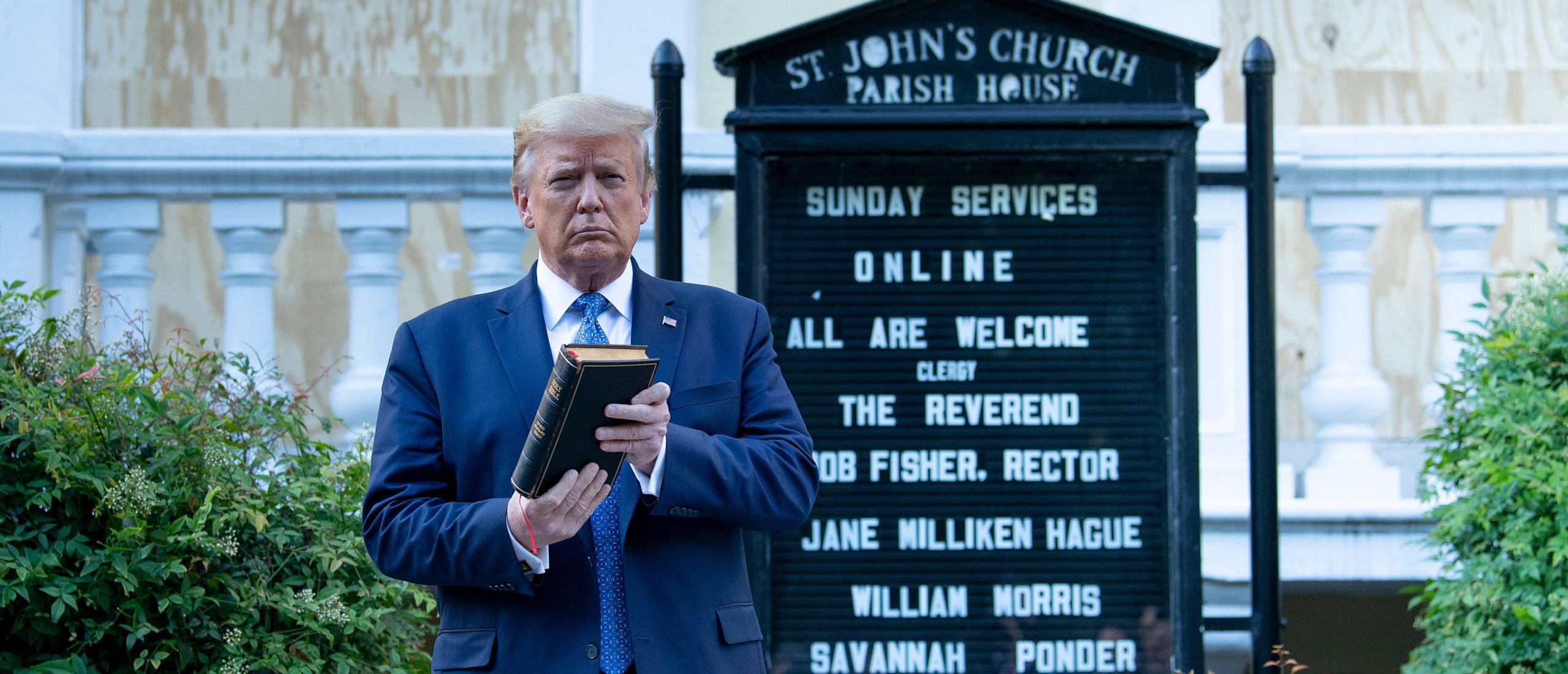 US President Donald Trump holds a Bible while visiting St. John's Church across from the White House after the area was cleared of people protesting the death of George Floyd June 1, 2020, in Washington, DC. - US President Donald Trump was due to make a televised address to the nation on Monday after days of anti-racism protests against police brutality that have erupted into violence. The White House announced that the president would make remarks imminently after he has been criticized for not publicly addressing in the crisis in recent days. (Photo by Brendan Smialowski / AFP) (Photo by BRENDAN SMIALOWSKI/AFP via Getty Images)
