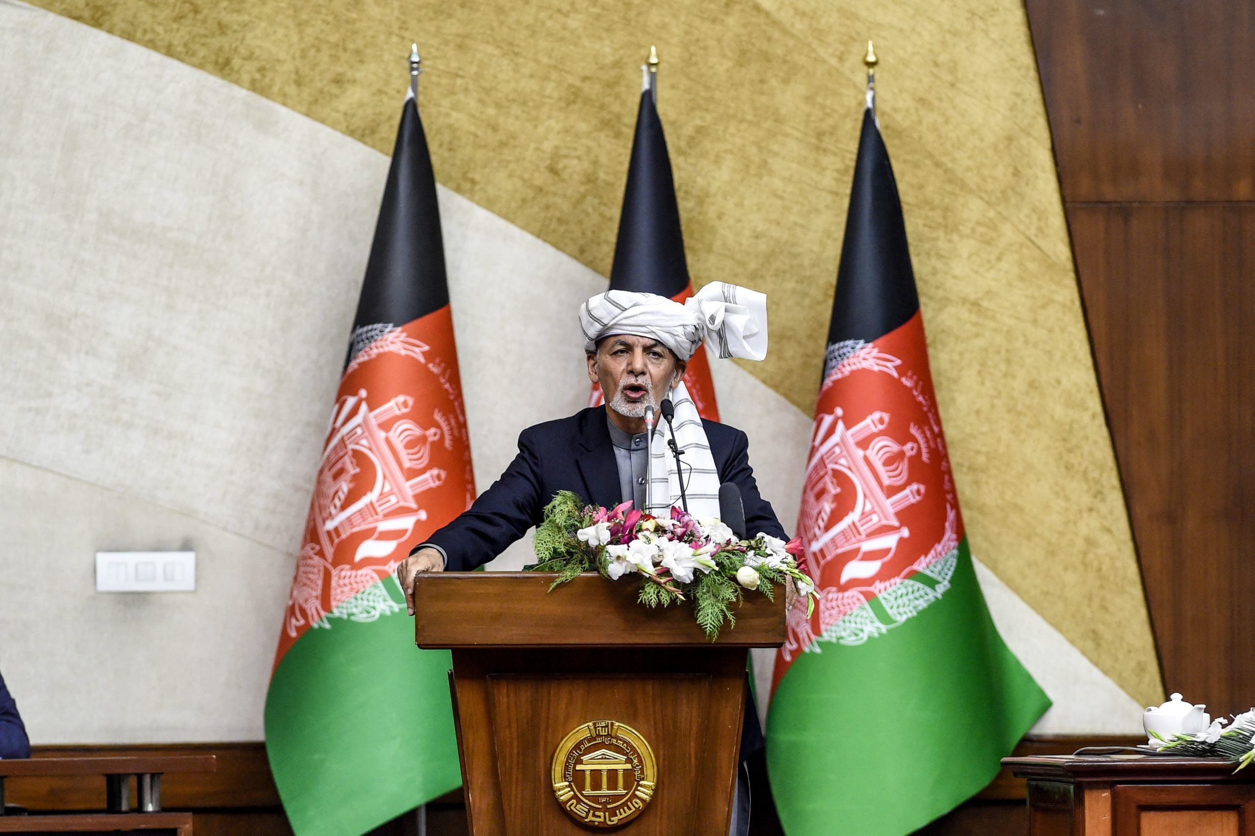 Afghanistan's President Ashraf Ghani speaks during the introduction of ministerial nominees at the Parliament in Kabul on October 21, 2020. (Photo by WAKIL KOHSAR / AFP) (Photo by WAKIL KOHSAR/AFP via Getty Images)