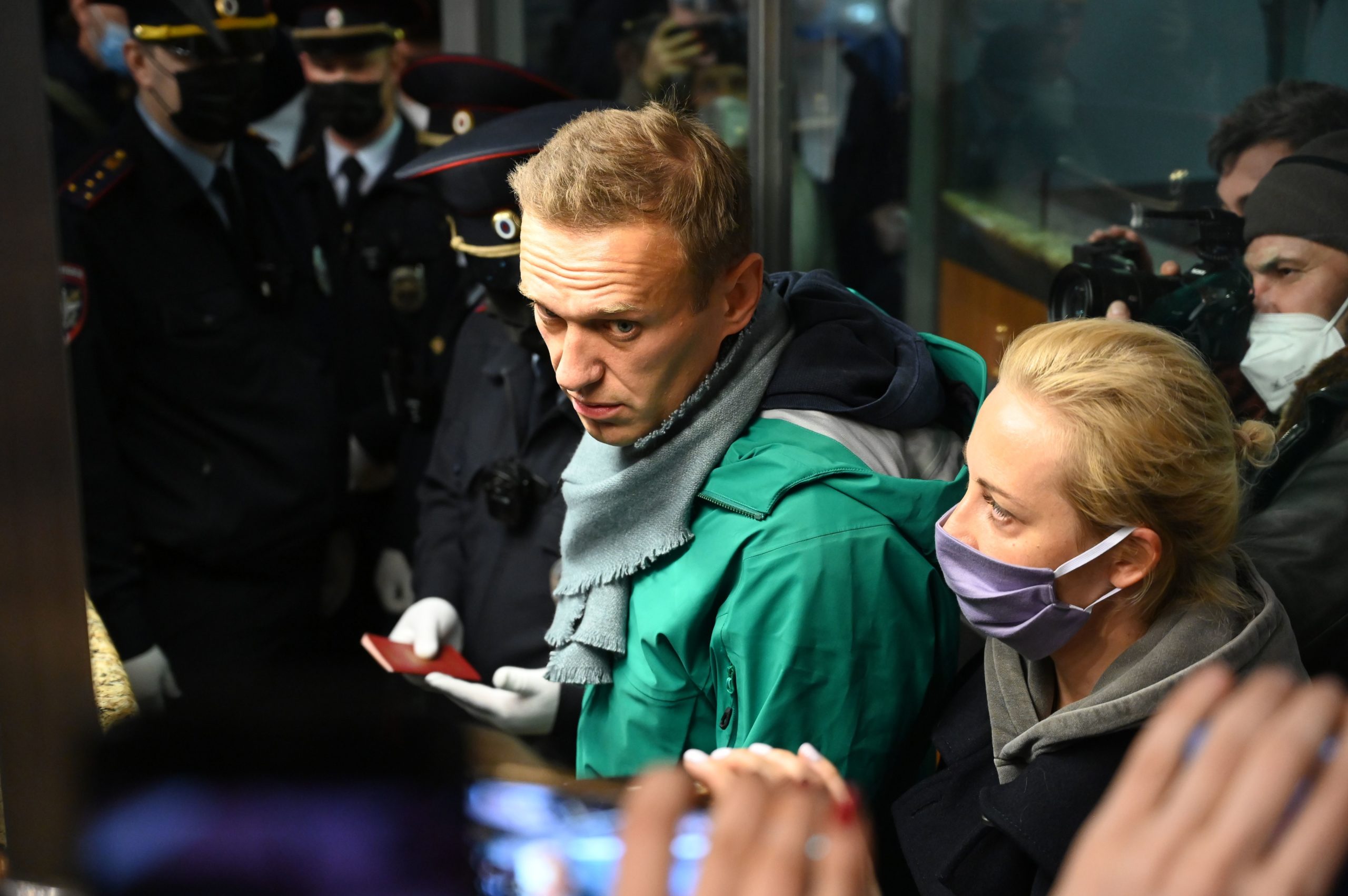 Russian opposition leader Alexei Navalny and his wife Yulia are seen at the passport control point at Moscow's Sheremetyevo airport on January 17, 2021. (KIRILL KUDRYAVTSEV/AFP via Getty Images)