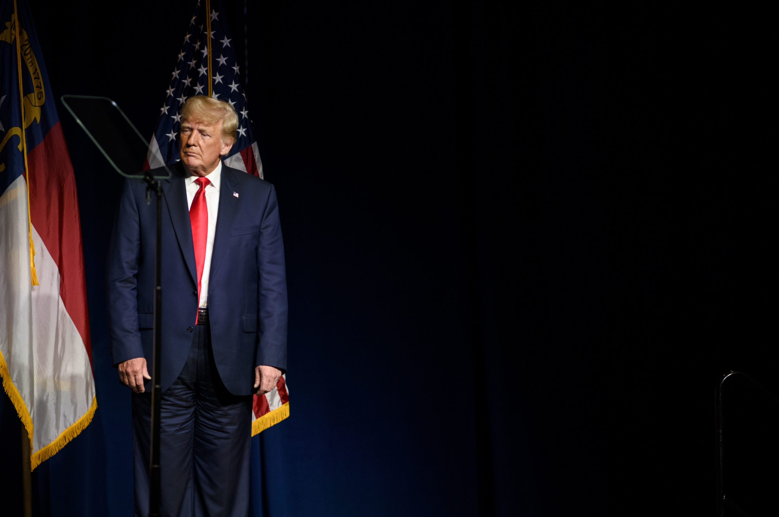 GREENVILLE, NC - JUNE 05: Former U.S. President Donald Trump listens to Laura Trump tell the crowd she has decided not to run for the N.C. Senate at the NCGOP state convention on June 5, 2021 in Greenville, North Carolina. The event is one of former U.S. President Donald Trumps first high-profile public appearances since leaving the White House in January. (Photo by Melissa Sue Gerrits/Getty Images)