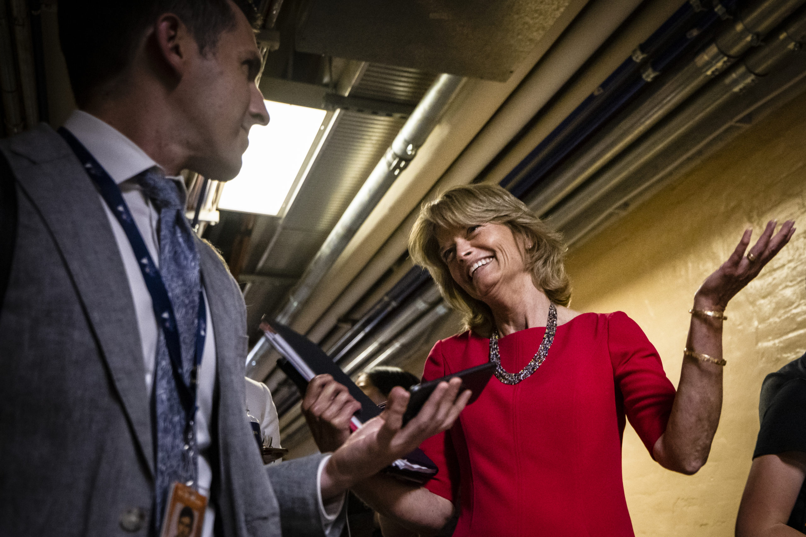 U.S. Sen. Lisa Murkowski (R-AK) reacts to questions from reporters as she leaves a bipartisan meeting on infrastructure in the basement of the U.S. Capitol building after the original talks fell through with the White House on June 8, 2021 in Washington, DC. (Samuel Corum/Getty Images)