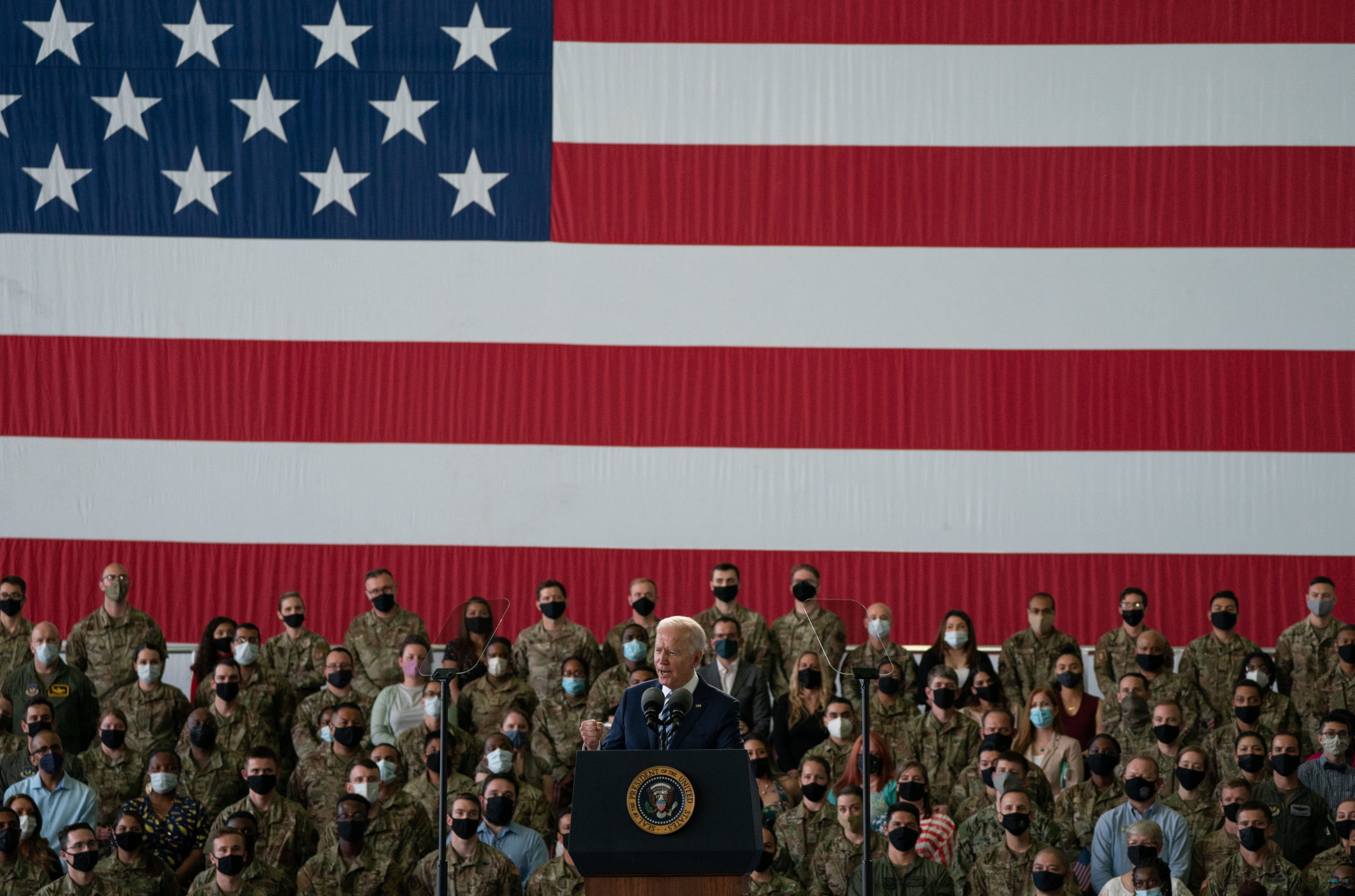 President Joe Biden addresses U.S. Air Force personnel in the U.K. on June 9. (Joe Giddens/WPA Pool/Getty Images)