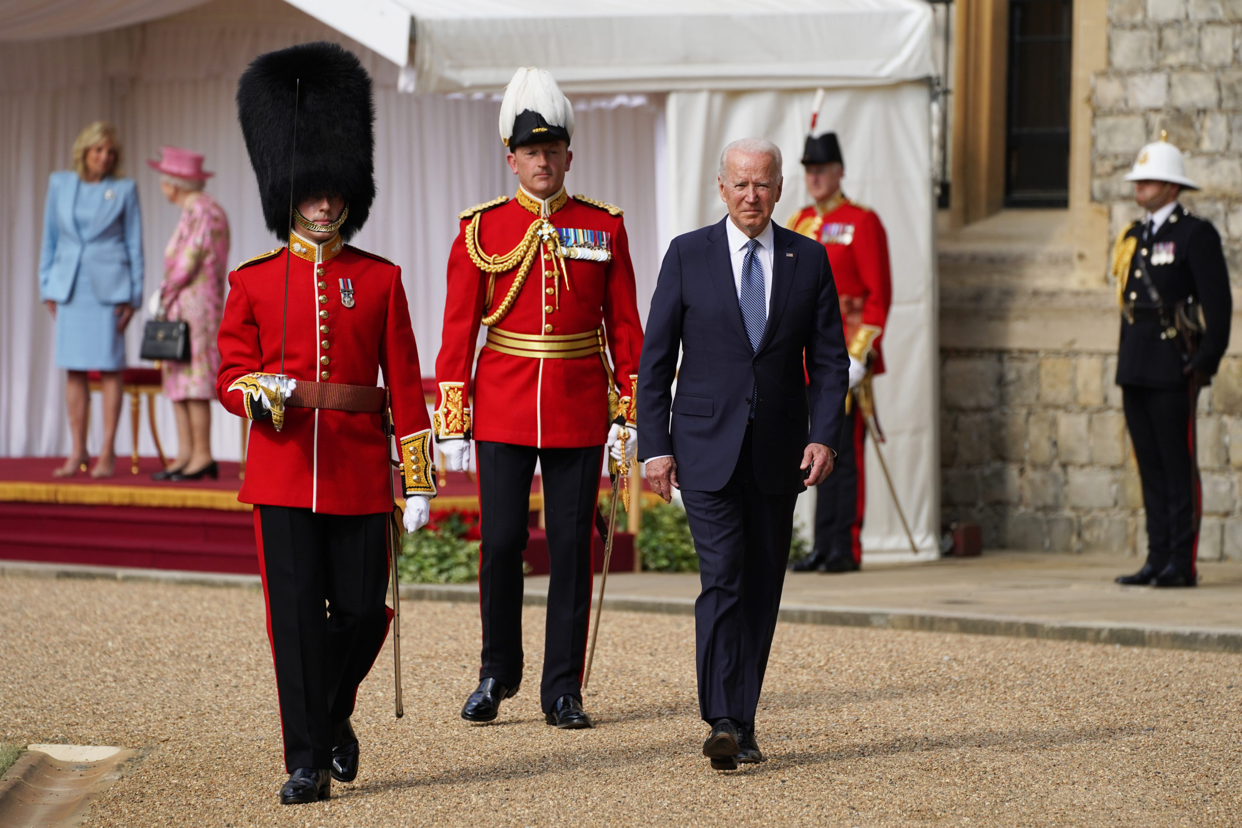 US President Joe Biden inspects a Guard of Honour during a visit to Windsor Castle to meet Queen Elizabeth II on June 13, 2021 in Windsor, England. Queen Elizabeth II hosts US President, Joe Biden and First Lady Dr Jill Biden at Windsor Castle. The President arrived from Cornwall where he attended the G7 Leader's Summit and will travel on to Brussels for a meeting of NATO Allies and later in the week he will meet President of Russia, Vladimir Putin. (Photo by Steve Parsons - WPA Pool/Getty Images)
