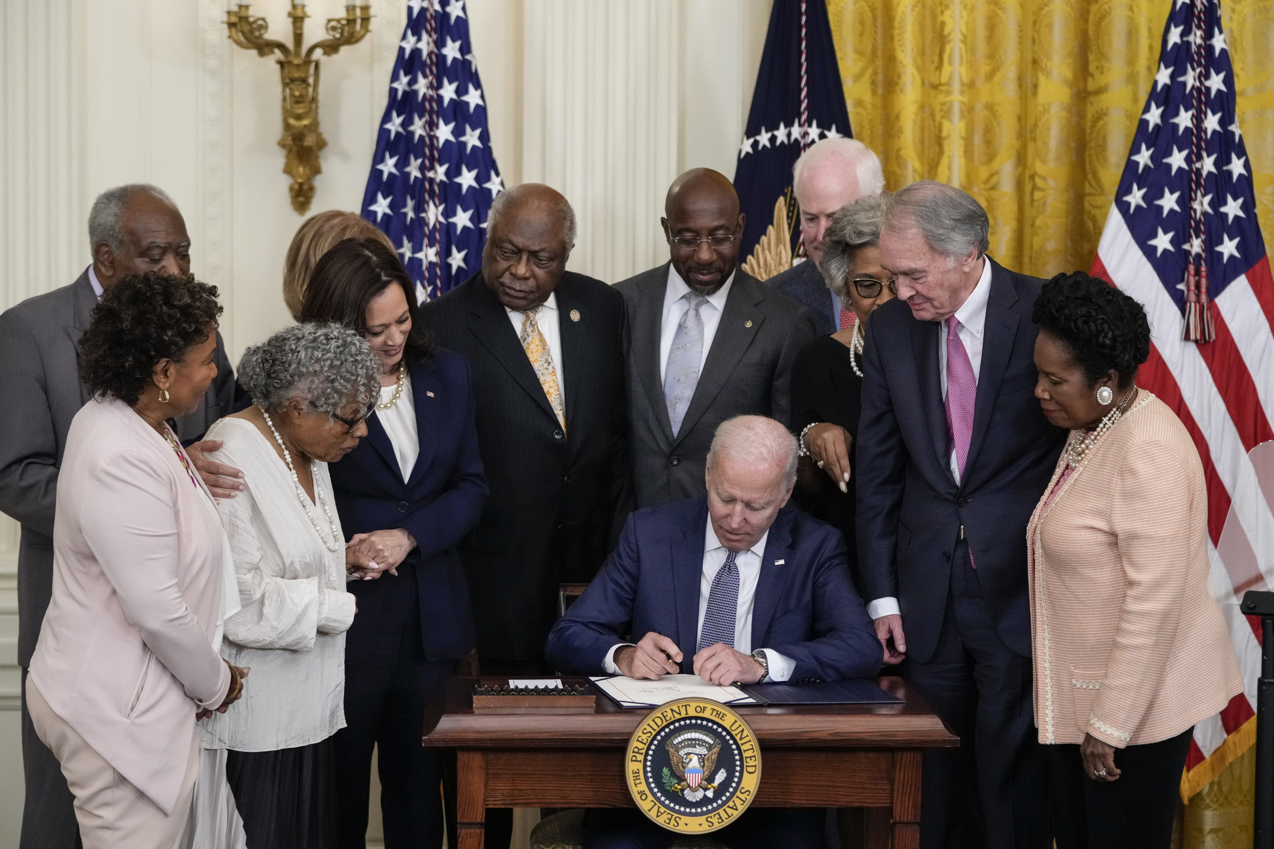 U.S. President Joe Biden signs the Juneteenth National Independence Day Act into law in the East Room of the White House on June 17, 2021 in Washington, DC. (Drew Angerer/Getty Images)