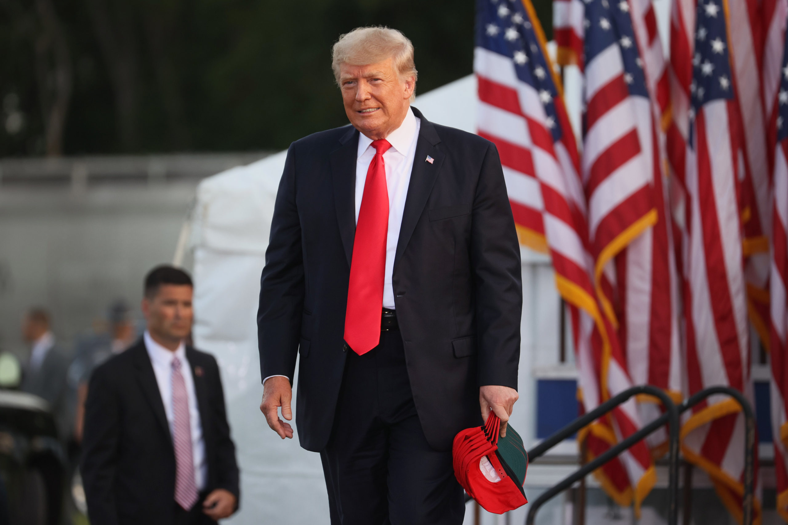 WELLINGTON, OHIO - JUNE 26: Former US President Donald Trump arrives for a rally at the Lorain County Fairgrounds on June 26, 2021 in Wellington, Ohio. Trump is in Ohio to campaign for his former White House advisor Max Miller. Miller is challenging incumbent Rep. Anthony Gonzales in the 16th congressional district GOP primary. This is Trump's first rally since leaving office. (Photo by Scott Olson/Getty Images)WELLINGTON, OHIO - JUNE 26: Former US President Donald Trump arrives for a rally at the Lorain County Fairgrounds on June 26, 2021 in Wellington, Ohio. Trump is in Ohio to campaign for his former White House advisor Max Miller. Miller is challenging incumbent Rep. Anthony Gonzales in the 16th congressional district GOP primary. This is Trump's first rally since leaving office. (Photo by Scott Olson/Getty Images)