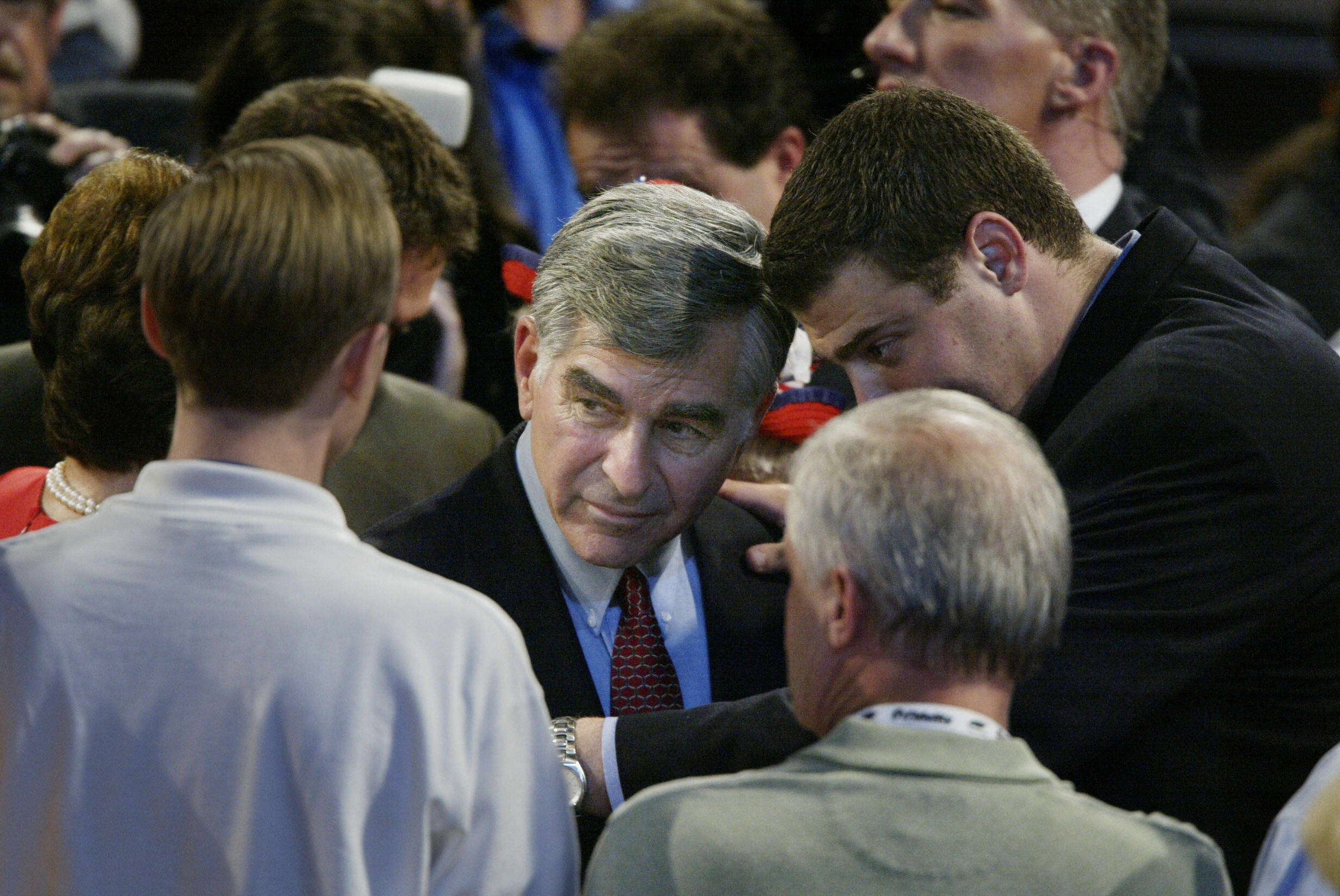 BOSTON, United States: Democratic presidential candidate of 1988 Michael Dukakis speaks with delegates at the Democratic National Convention 28 July, 2004, in Boston, Massachusetts. Dukakis lost the 1988 election to George Bush. AFP PHOTO/PAUL J. RICHARDS (Photo credit should read PAUL J. RICHARDS/AFP via Getty Images)