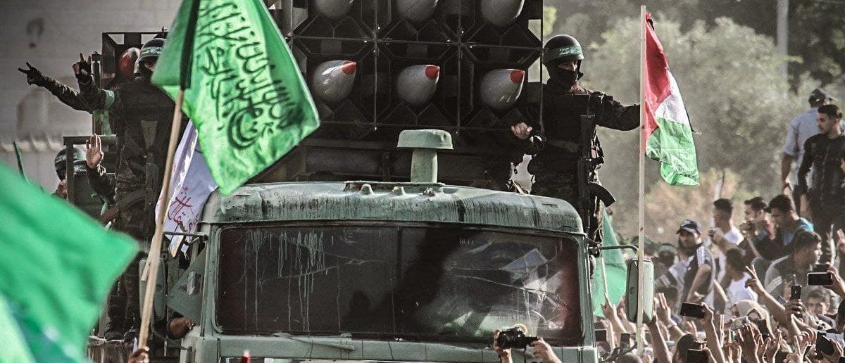 Picture released by Hamas showing its militants on a vehicle in a parade in Gaza following the end of a two week war with Israel in May (Photo: Hamas/Press Release)