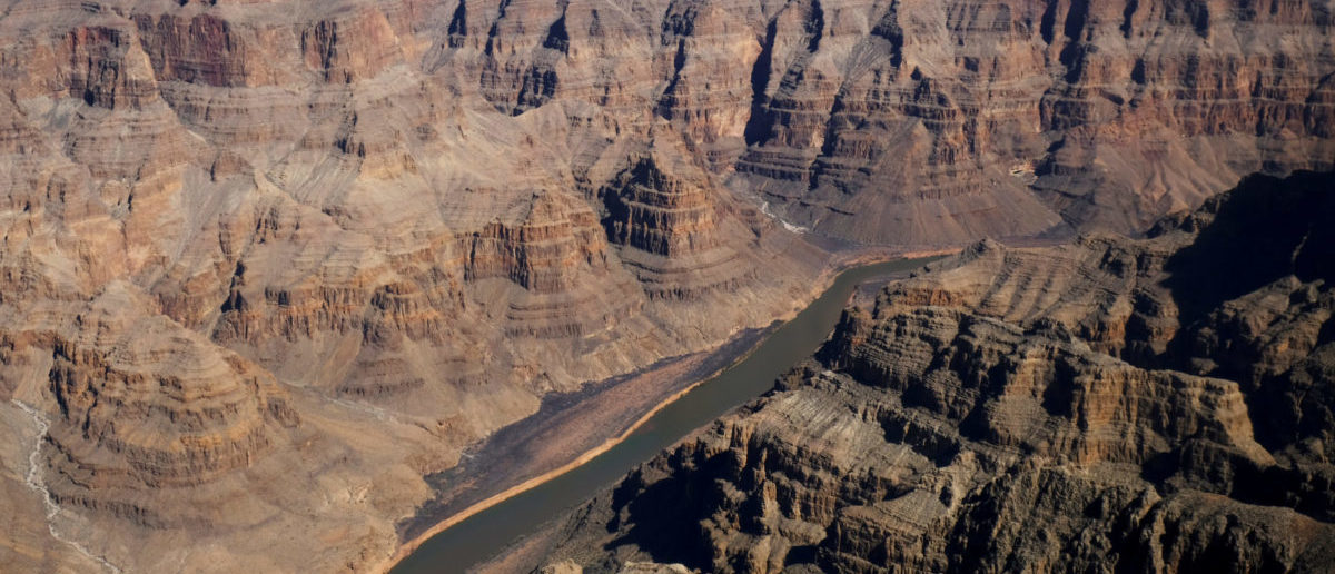 The Colorado River runs through the west rim of the Grand Canyon in Arizona, U.S. February 28, 2018. Picture taken February 28, 2018. REUTERS/Darrin Zammit Lupi