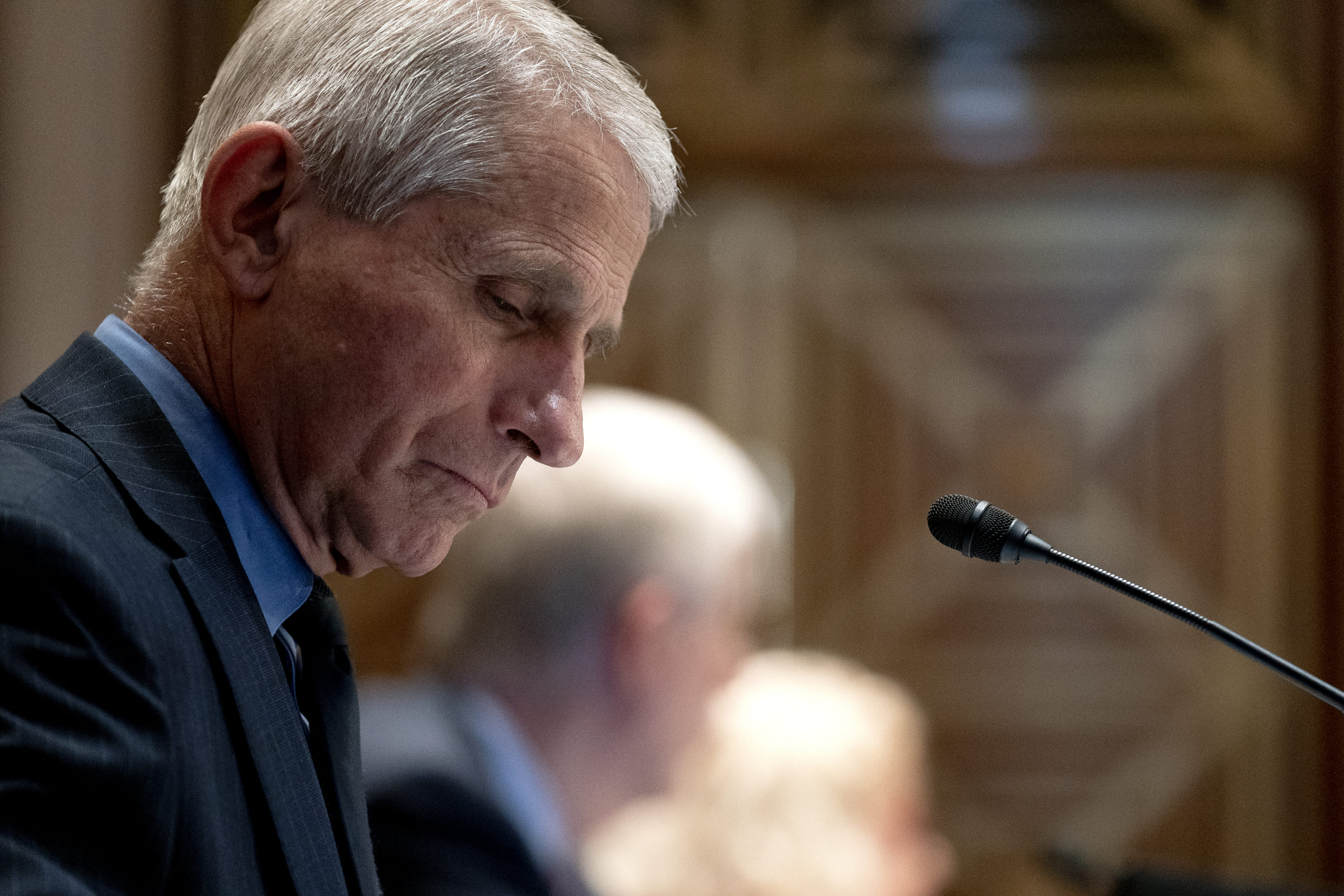 Dr. Anthony Fauci, Director of the National Institute of Allergy and Infectious Diseases, listens during a Senate Appropriations Subcommittee hearing May 26, 2021 on Capitol Hill in Washington, D.C. (Photo by Stefani Reynolds-Pool/Getty Images)