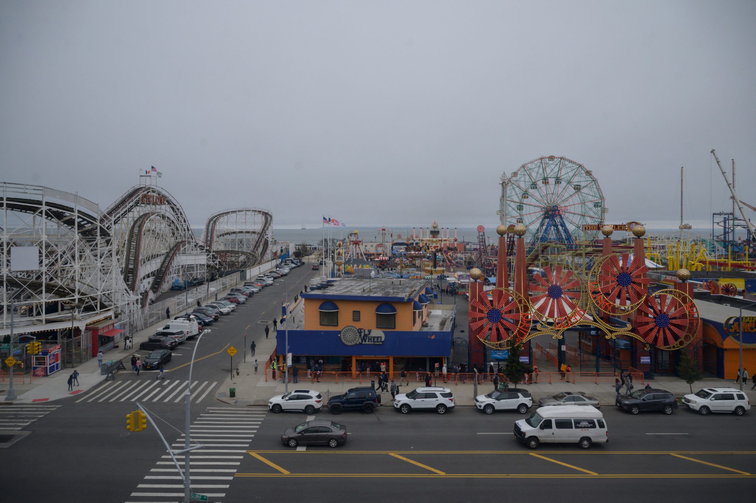 Visitors ride attractions on the opening day of the 2021 season at the Luna Park amusement park in Coney Island, New York on April 9, 2021. (Photo by ED JONES/AFP via Getty Images)
