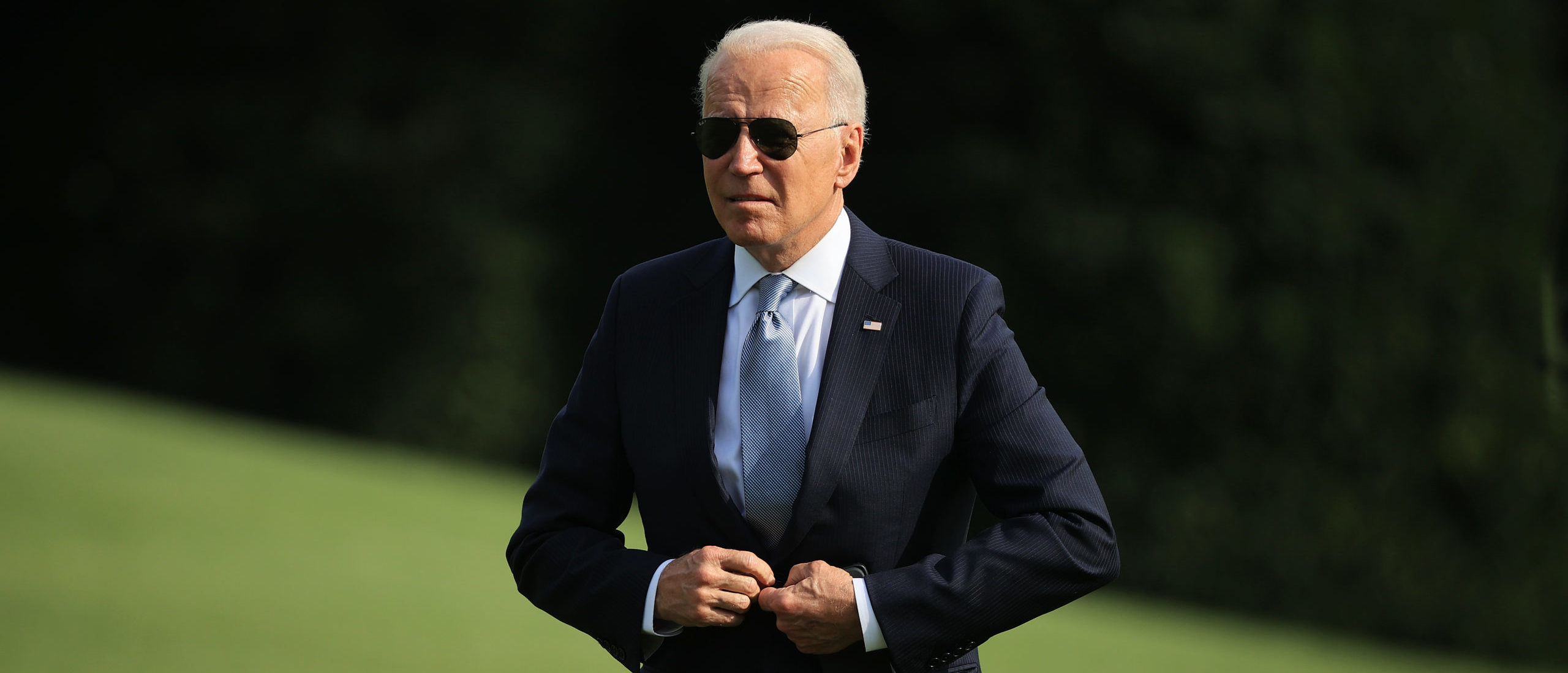 U.S. President Joe Biden walks across the South Lawn as he returns to the White House on July 13, 2021 in Washington, DC. (Photo by Chip Somodevilla/Getty Images)