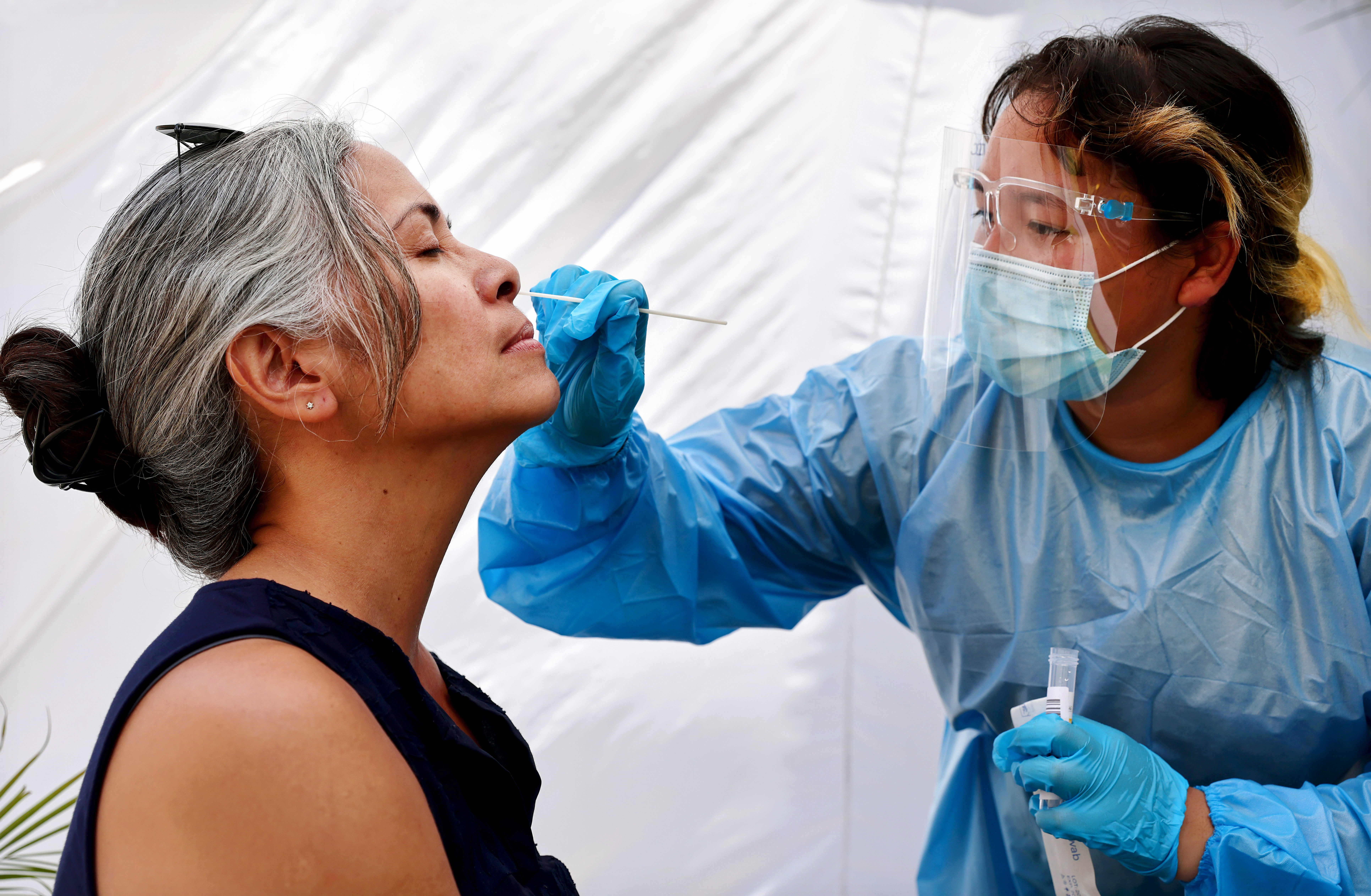 People get tested in Los Angeles, California amid a rise in cases. (Mario Tama/Getty Images)