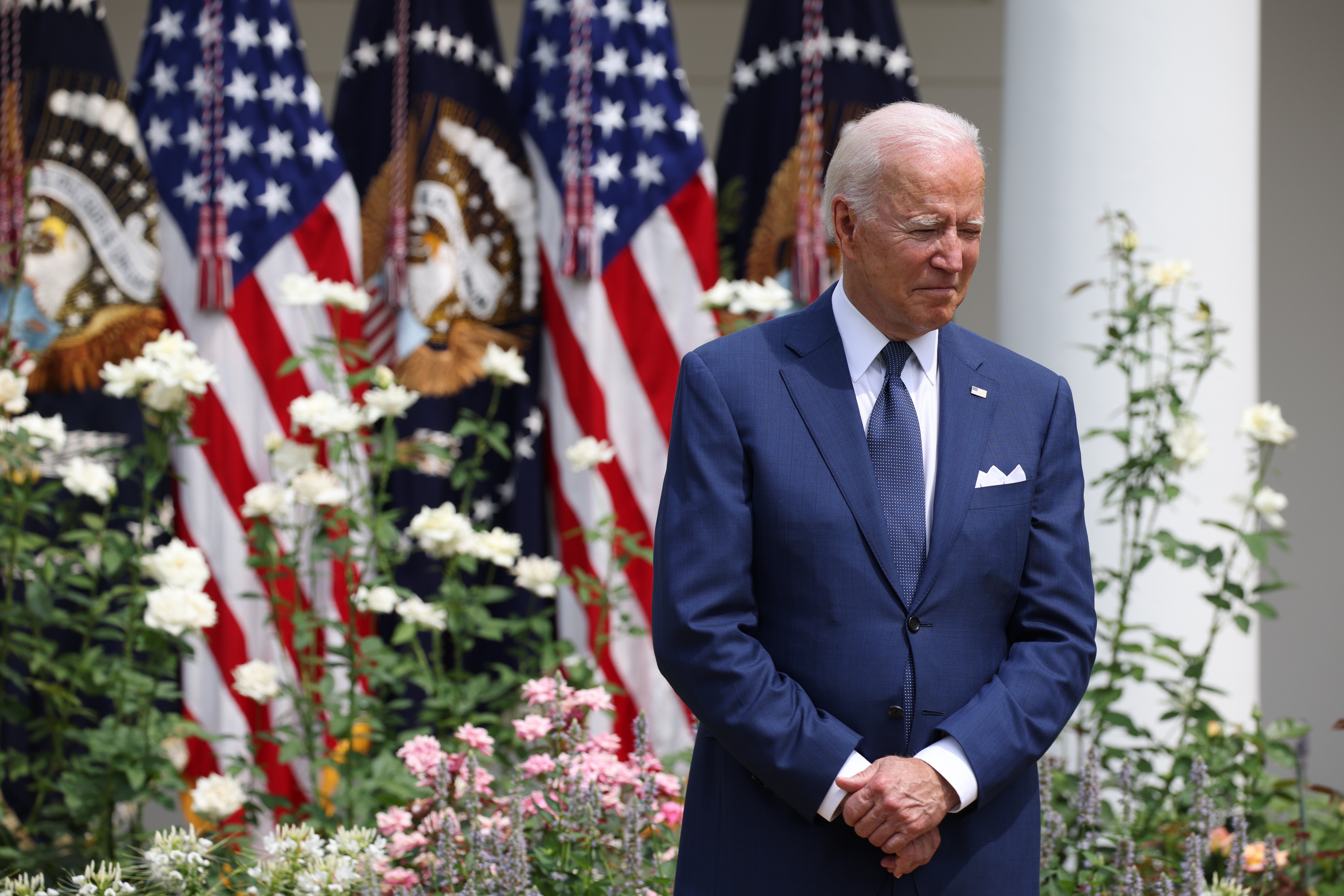 U.S. President Joe Biden listens as Vice President Kamala Harris delivers remarks in the Rose Garden of the White House on July 26, 2021 in Washington, DC. (Photo by Anna Moneymaker/Getty Images)