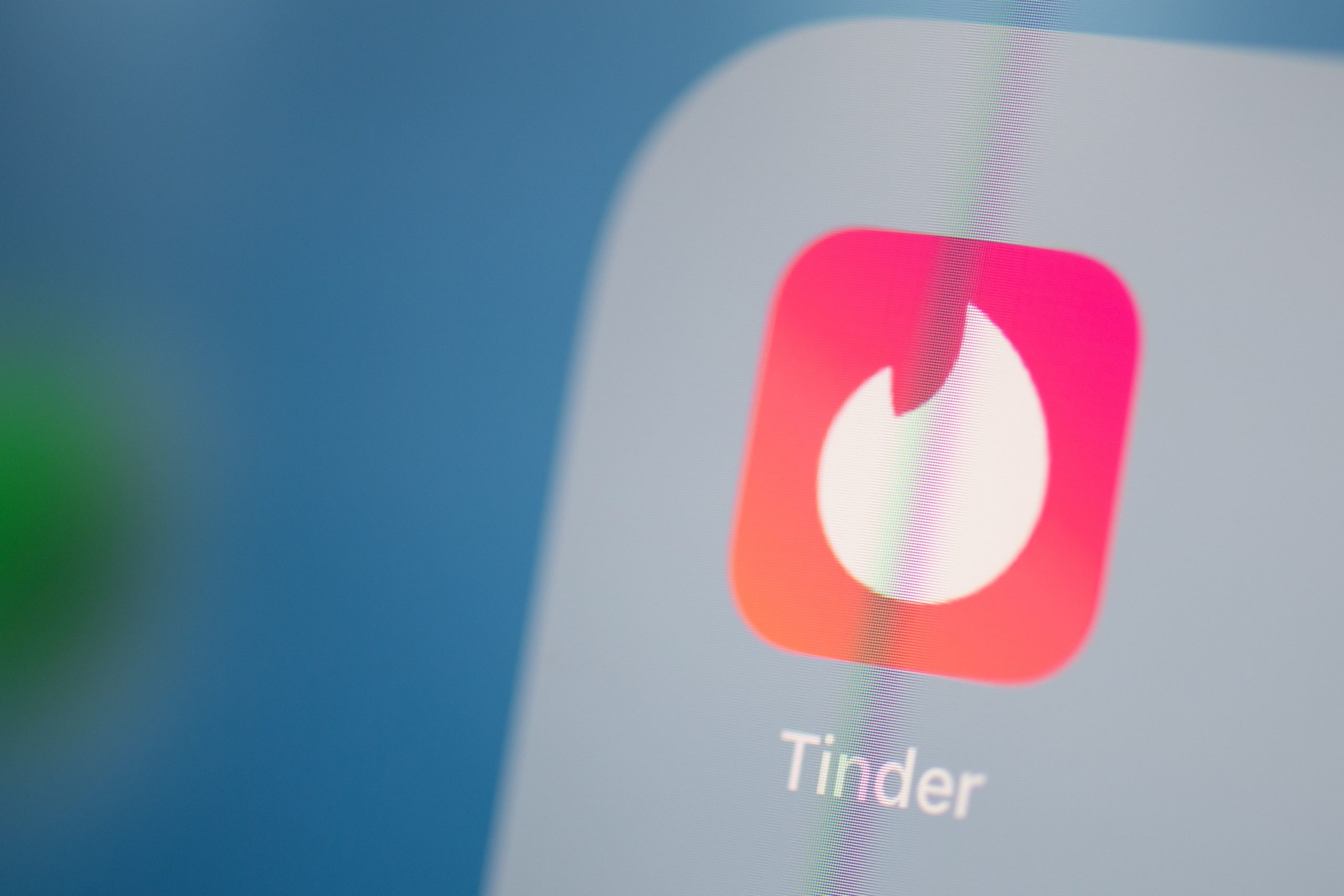 This illustration picture taken on July 24, 2019 in Paris shows the logo of the US social networking application Tinder on the screen of a tablet. (Photo by MARTIN BUREAU/AFP via Getty Images)