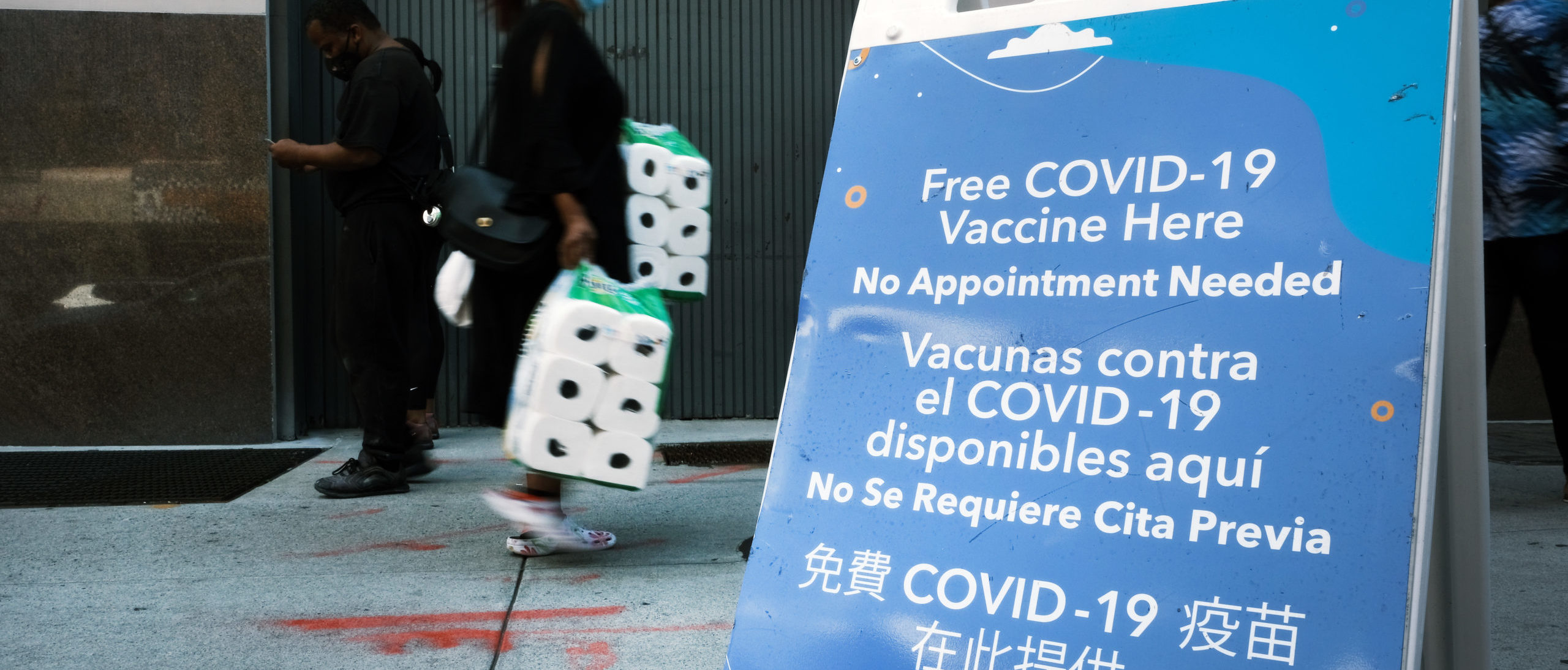 A city-operated mobile pharmacy advertises the COVID-19 vaccine in a Brooklyn neighborhood on July 30, 2021 in New York City. (Photo by Spencer Platt/Getty Images)