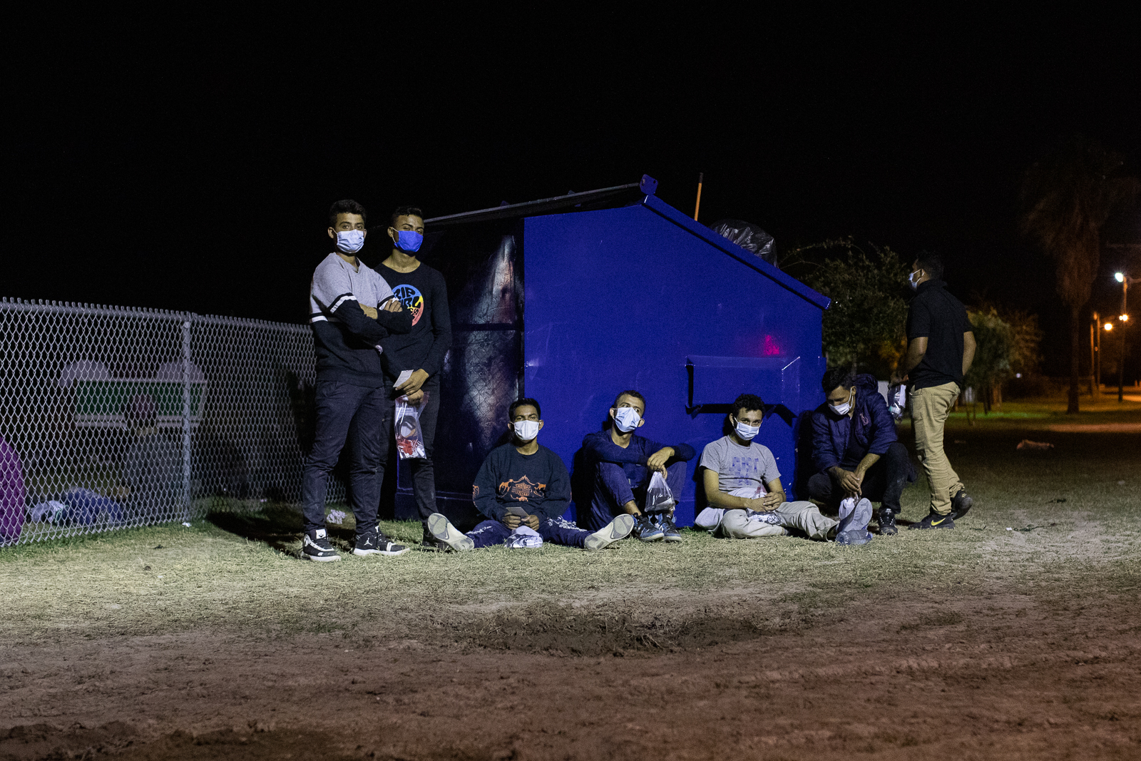 Some migrants traveling in a group consisting of only men attempted to avoid law enforcement officials after illegally entering the U.S. by running into bushes told Border Patrol agents they were 17-years-old after they were apprehended near La Joya, Texas on August 7, 2021. (Kaylee Greenlee - Daily Caller News Foundation)