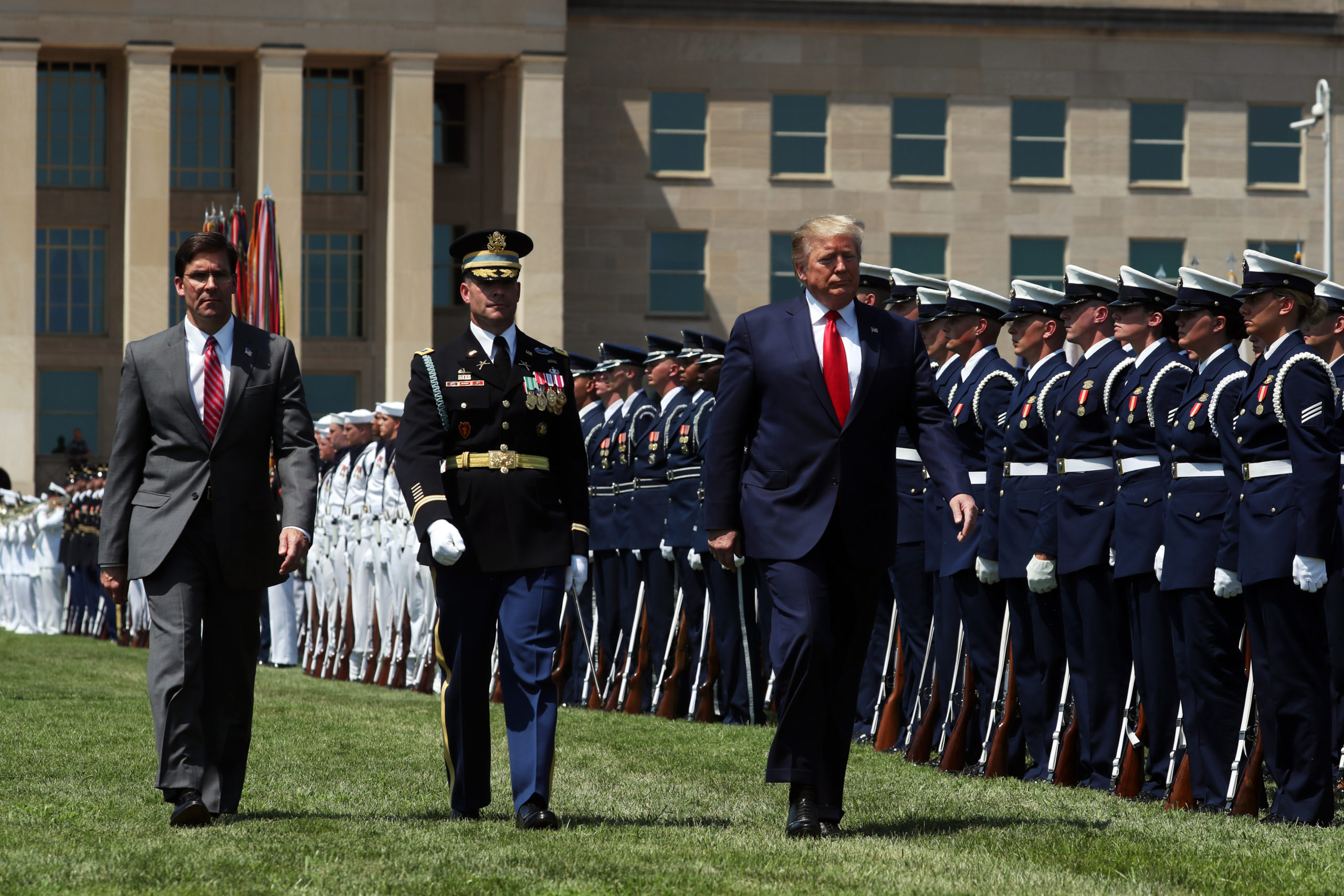 ARLINGTON, VA - JULY 25: U.S. President Donald Trump (R) and Secretary of Defense Dr. Mark Esper (L) inspect the troops during a full honors welcome ceremony on the parade grounds at the Pentagon, on July 25, 2019 in Arlington, Virginia. Earlier this week Esper was sworn in as the 27th Secretary of Defense. (Photo by Mark Wilson/Getty Images)