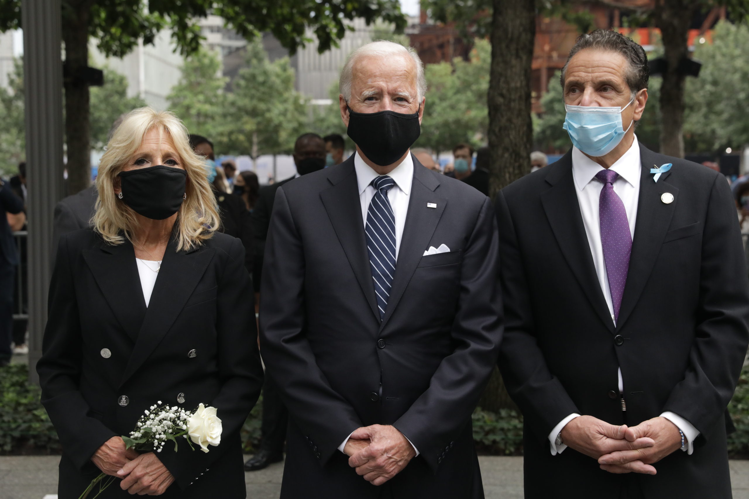 NEW YORK, NEW YORK - SEPTEMBER 11: Democratic presidential nominee Joe Biden (center), Dr. Jill Biden (left) and New York Gov. Andrew Cuomo (right) attend a 9/11 memorial service at the National September 11 Memorial and Museum on September 11, 2020 in New York City.  (Photo by Amr Alfiky - Pool/Getty Images)